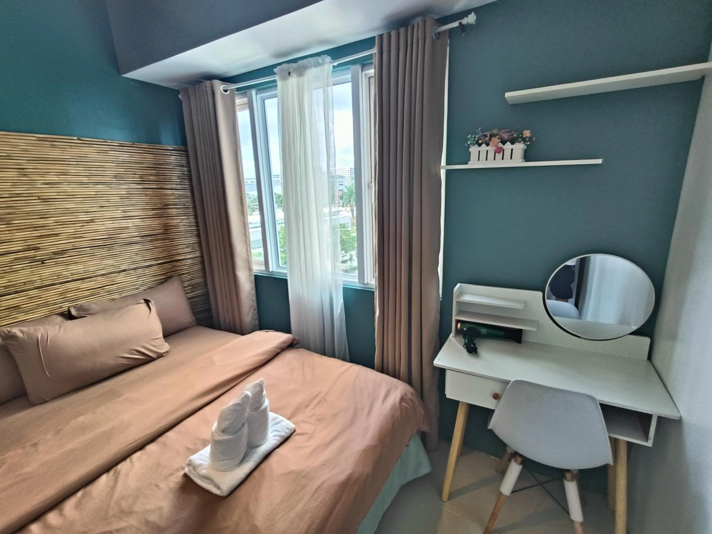 Bed in Premiere Haven MOA Staycation