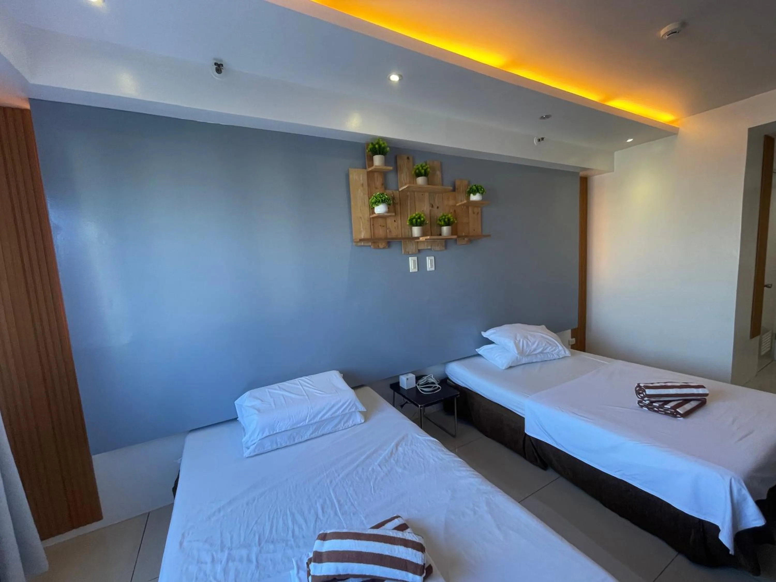 Bed in Premiere Haven MOA Staycation