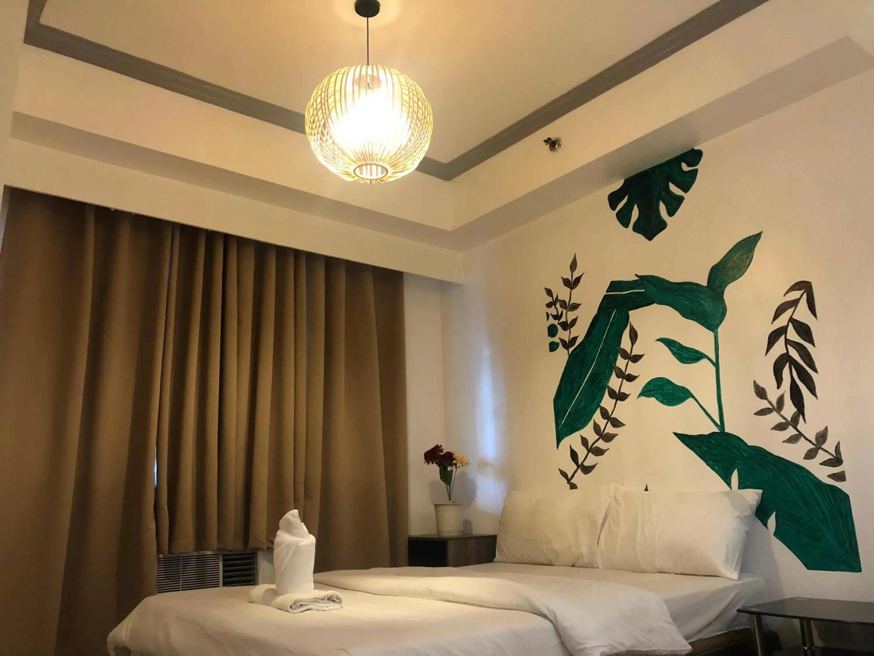 Bed in Premiere Haven MOA Staycation