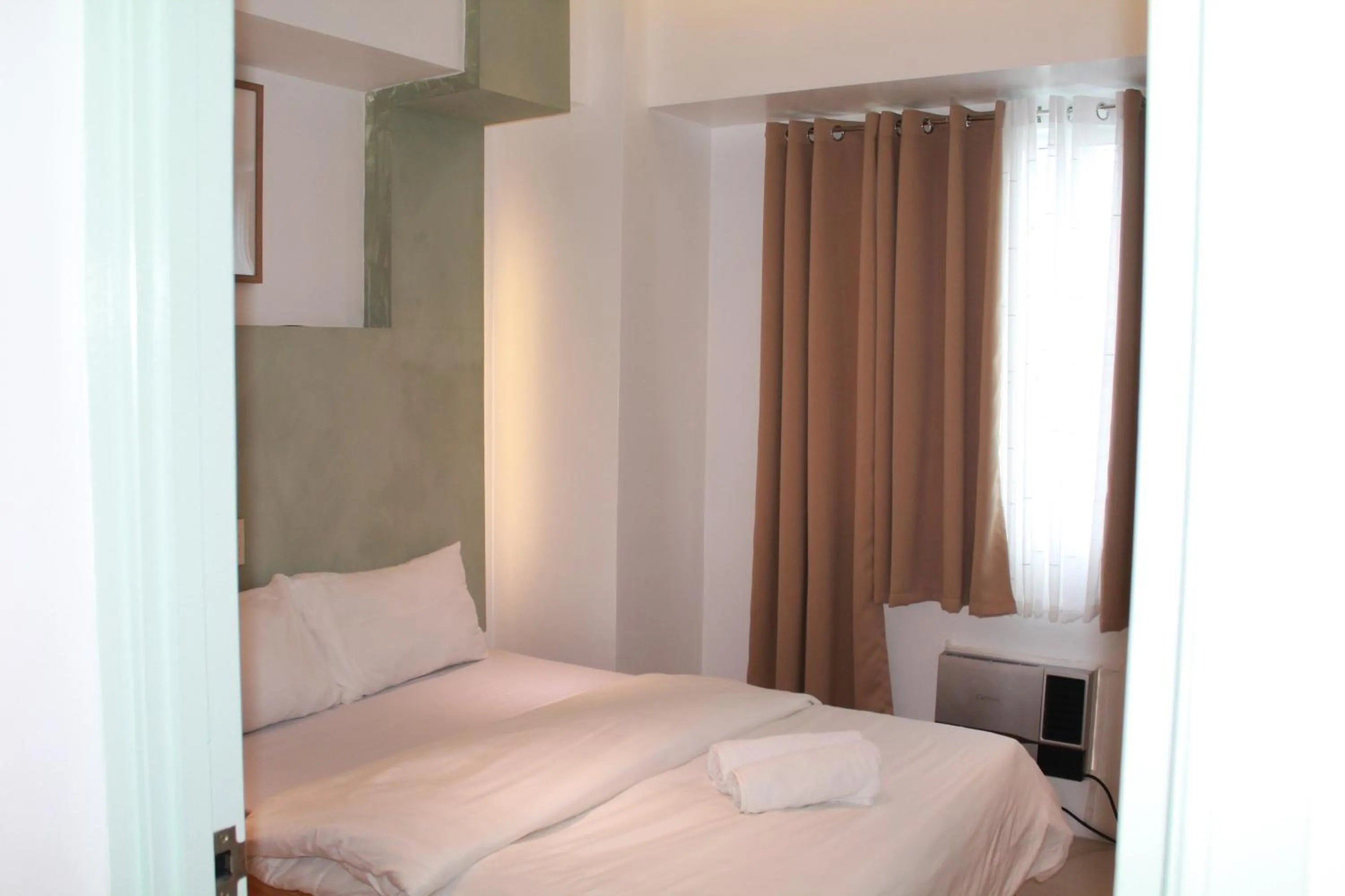 Bed in Premiere Haven MOA Staycation