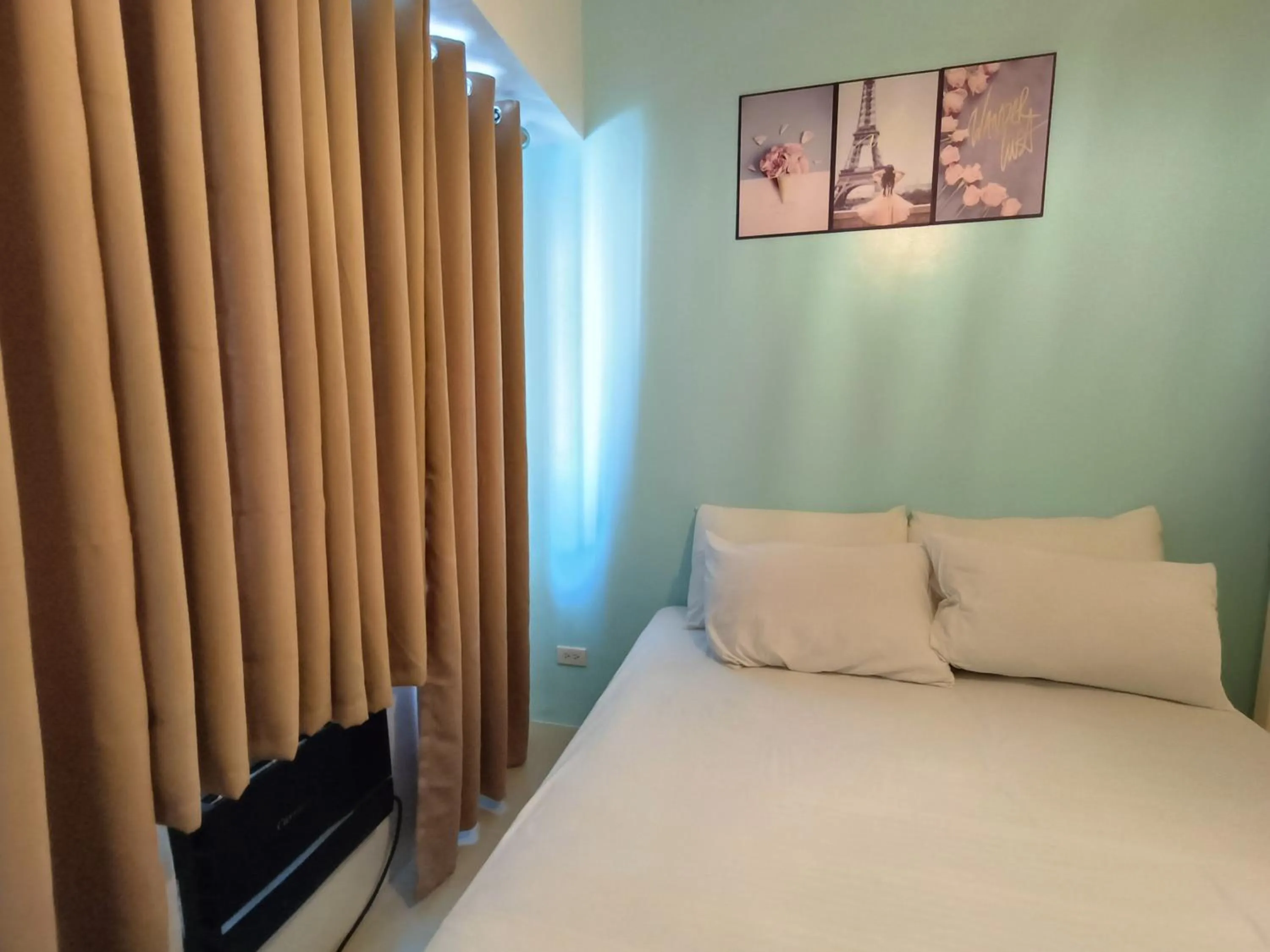 Bed in Premiere Haven MOA Staycation