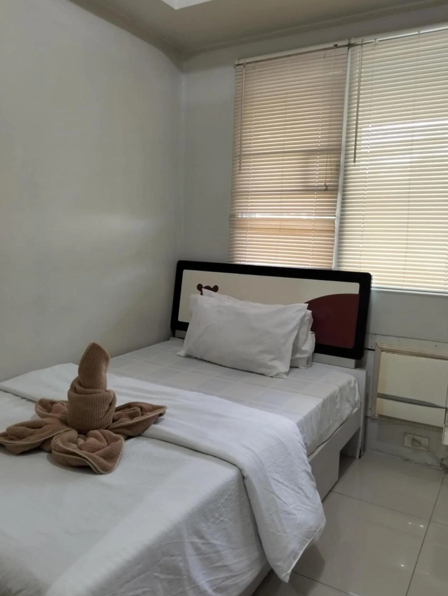 Bed in Premiere Haven MOA Staycation