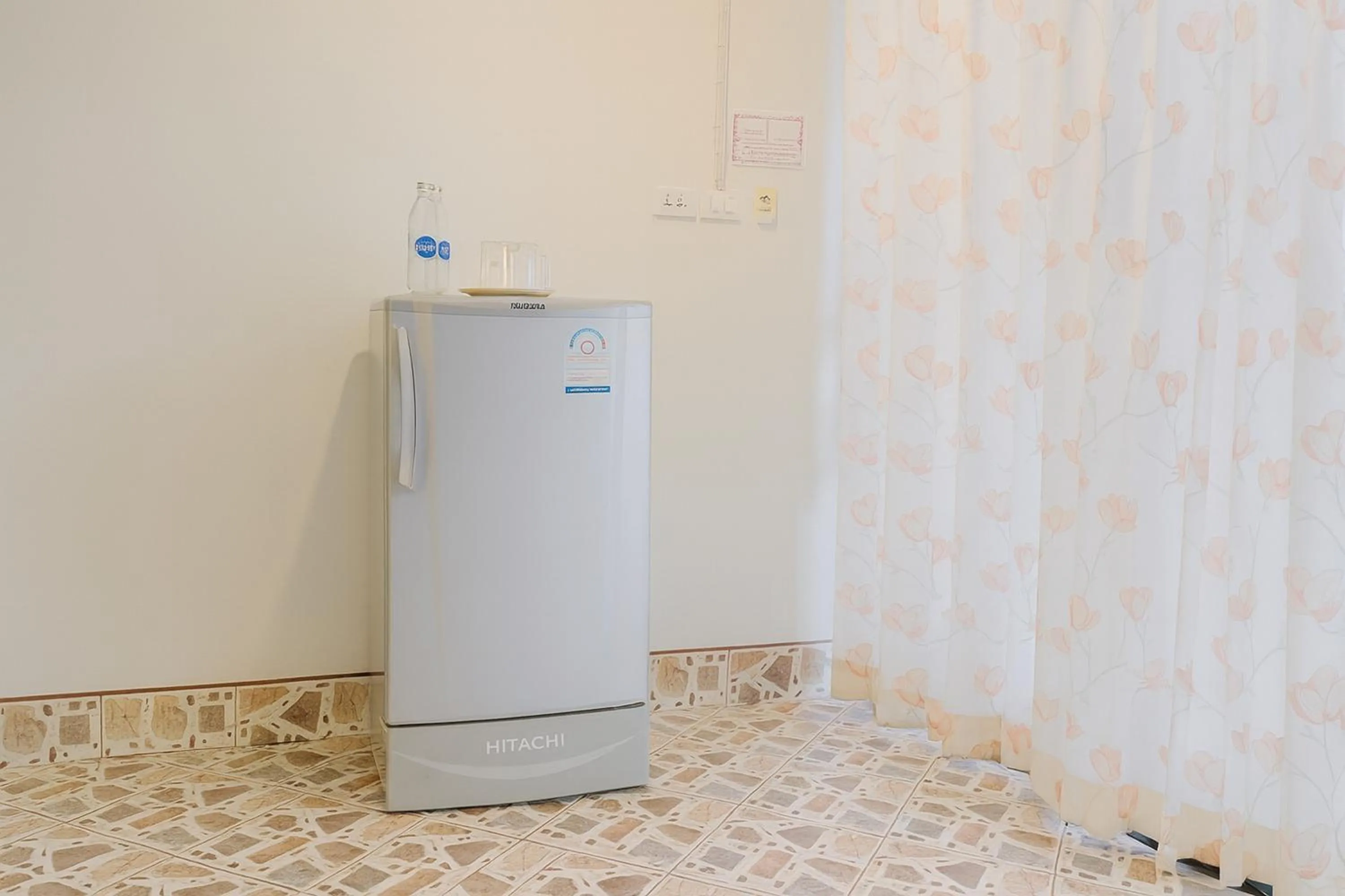 Kitchen or kitchenette in Kamala Orchid Guesthouse