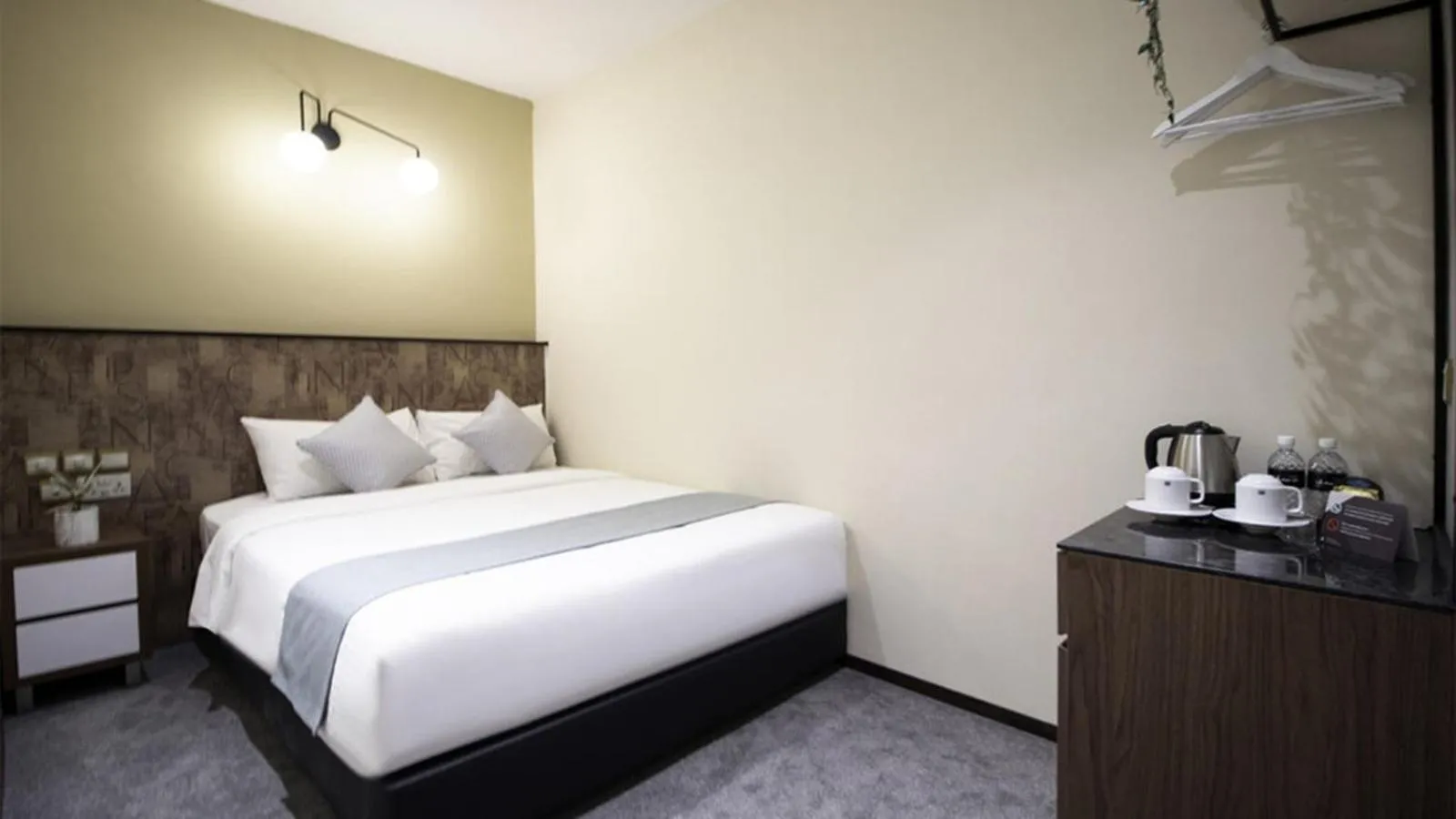 Bed in Hotel Calmo Hamilton