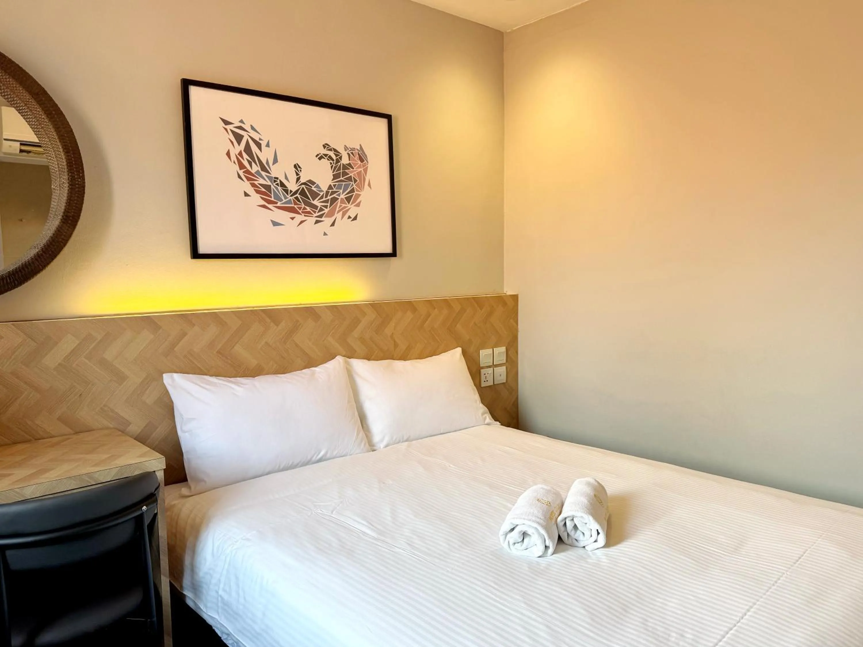 Bed in Hotel Calmo Hamilton
