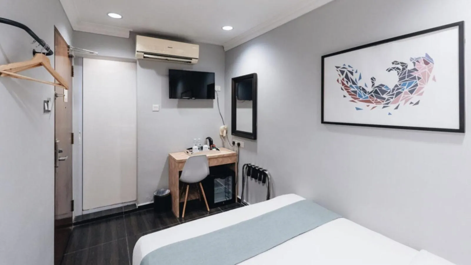 Bed in Hotel Calmo Hamilton