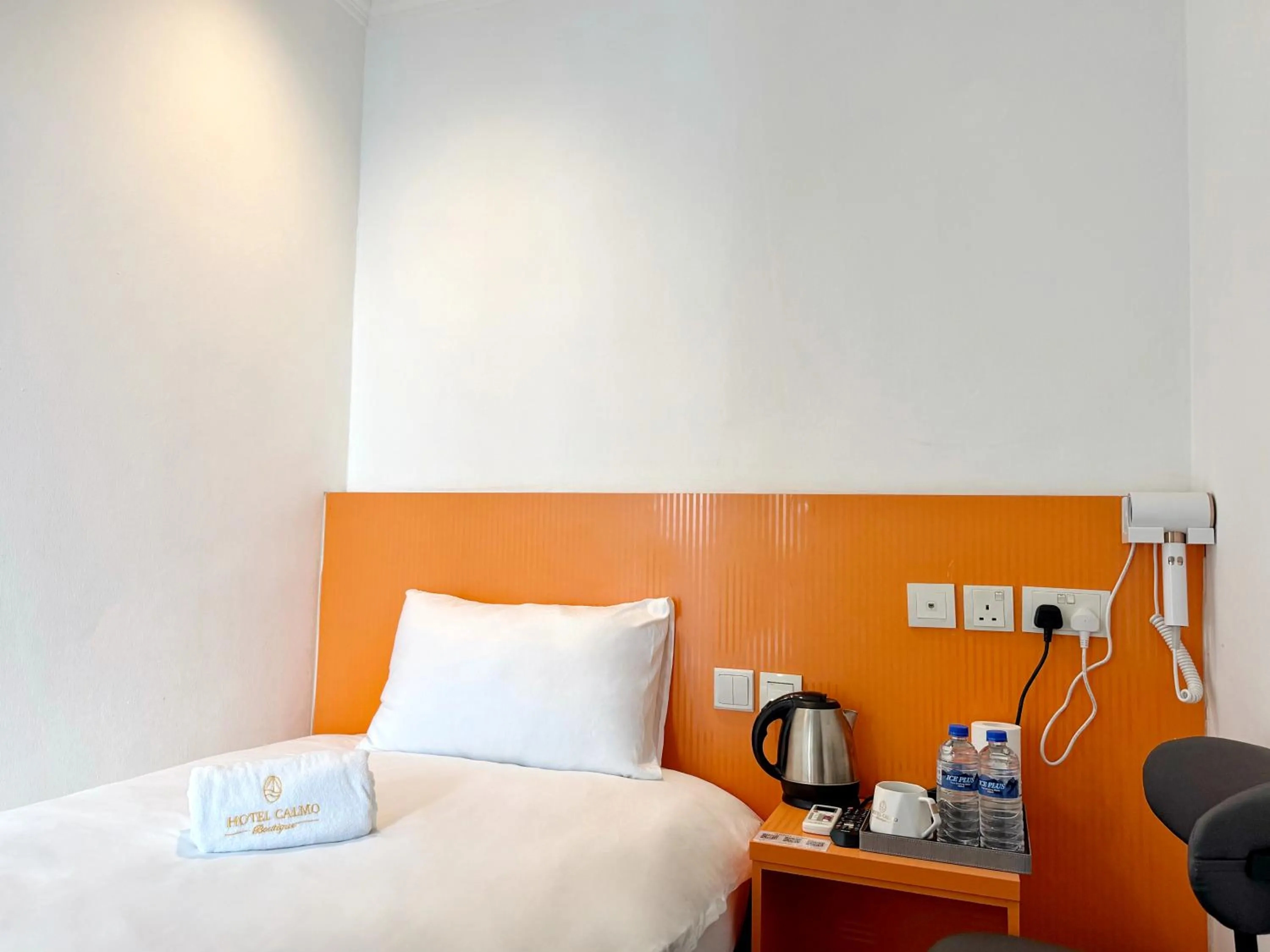 Bed in Hotel Calmo Hamilton