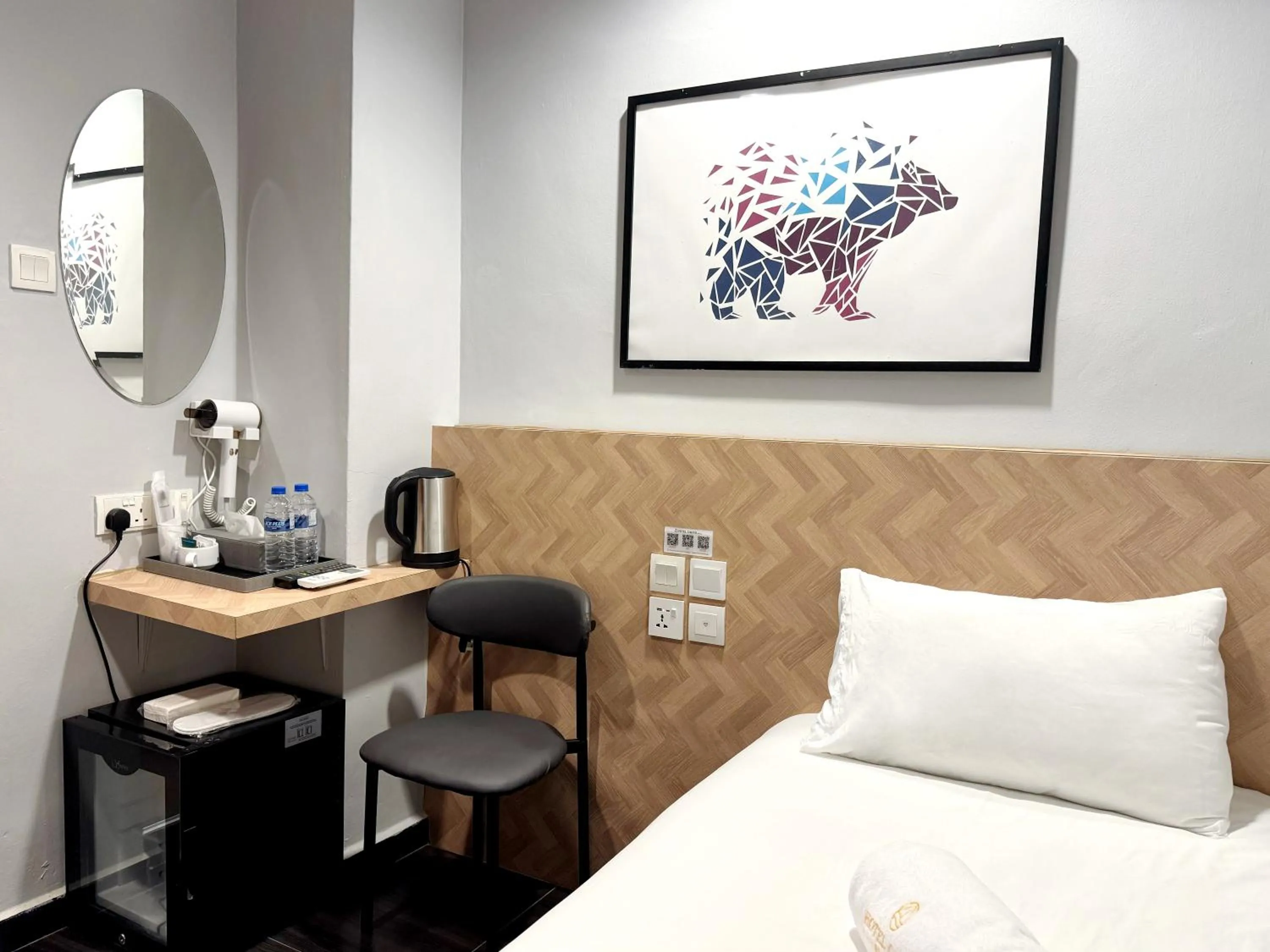Bed in Hotel Calmo Hamilton