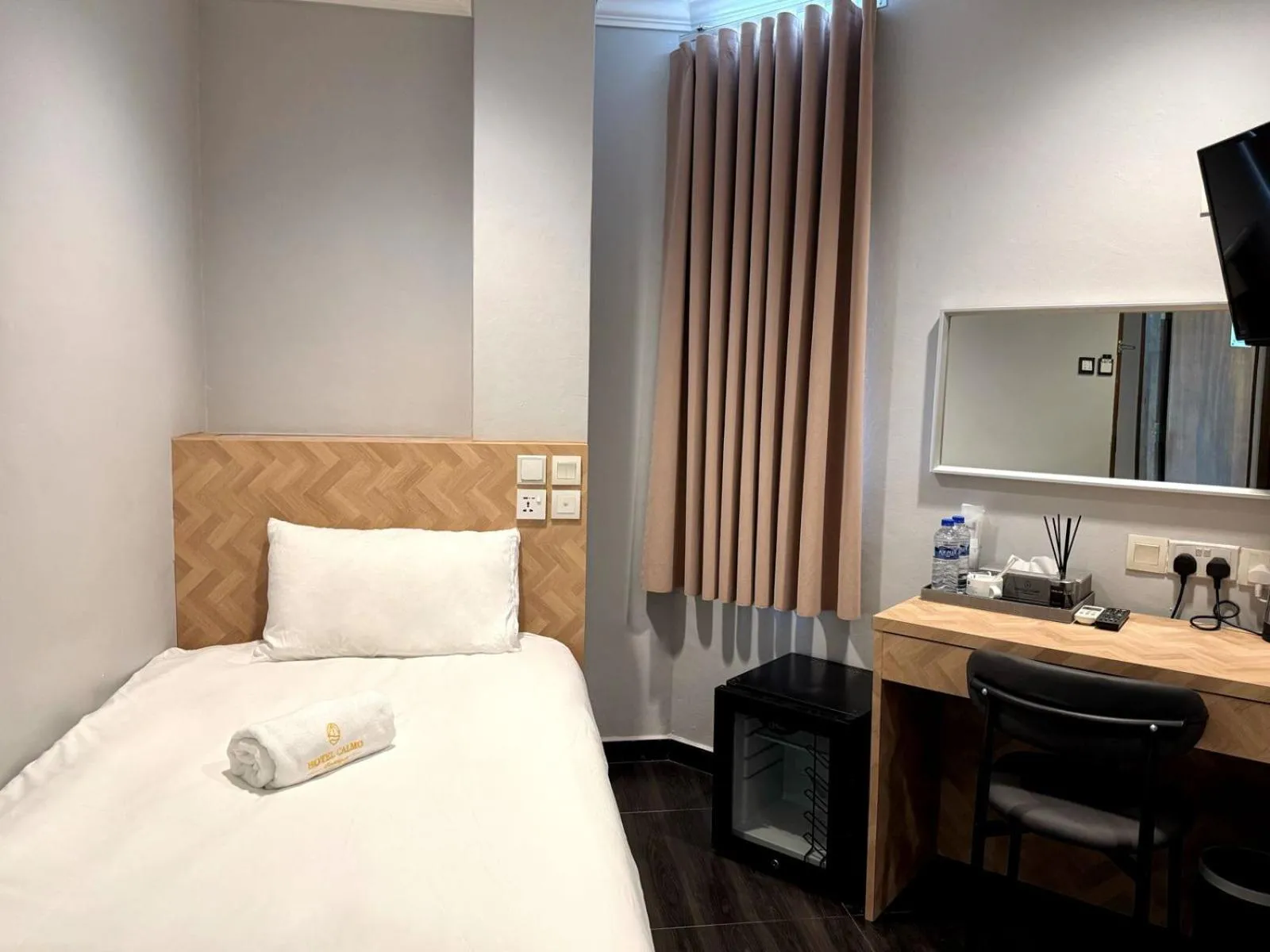Bed in Hotel Calmo Hamilton