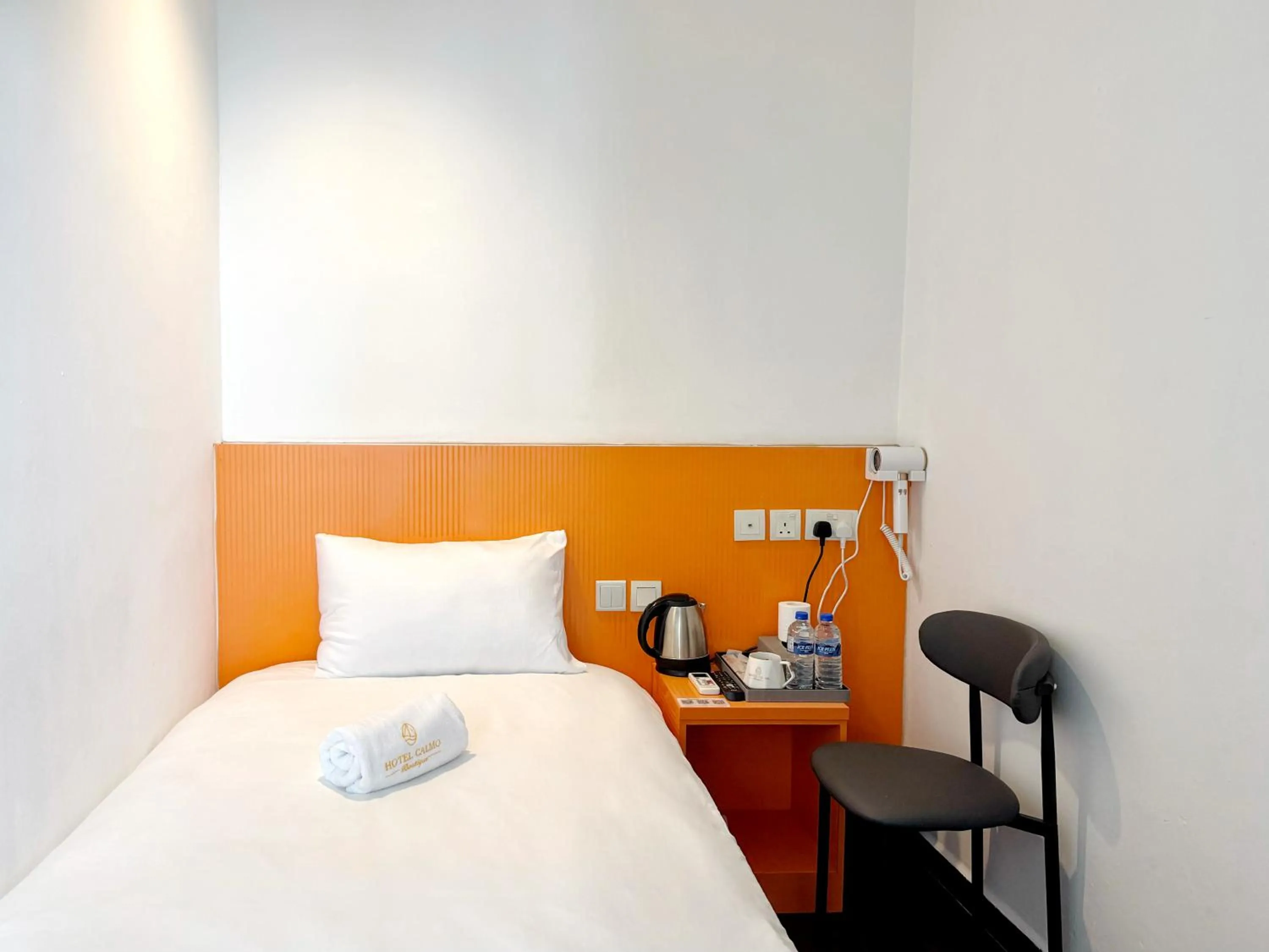 Bed in Hotel Calmo Hamilton