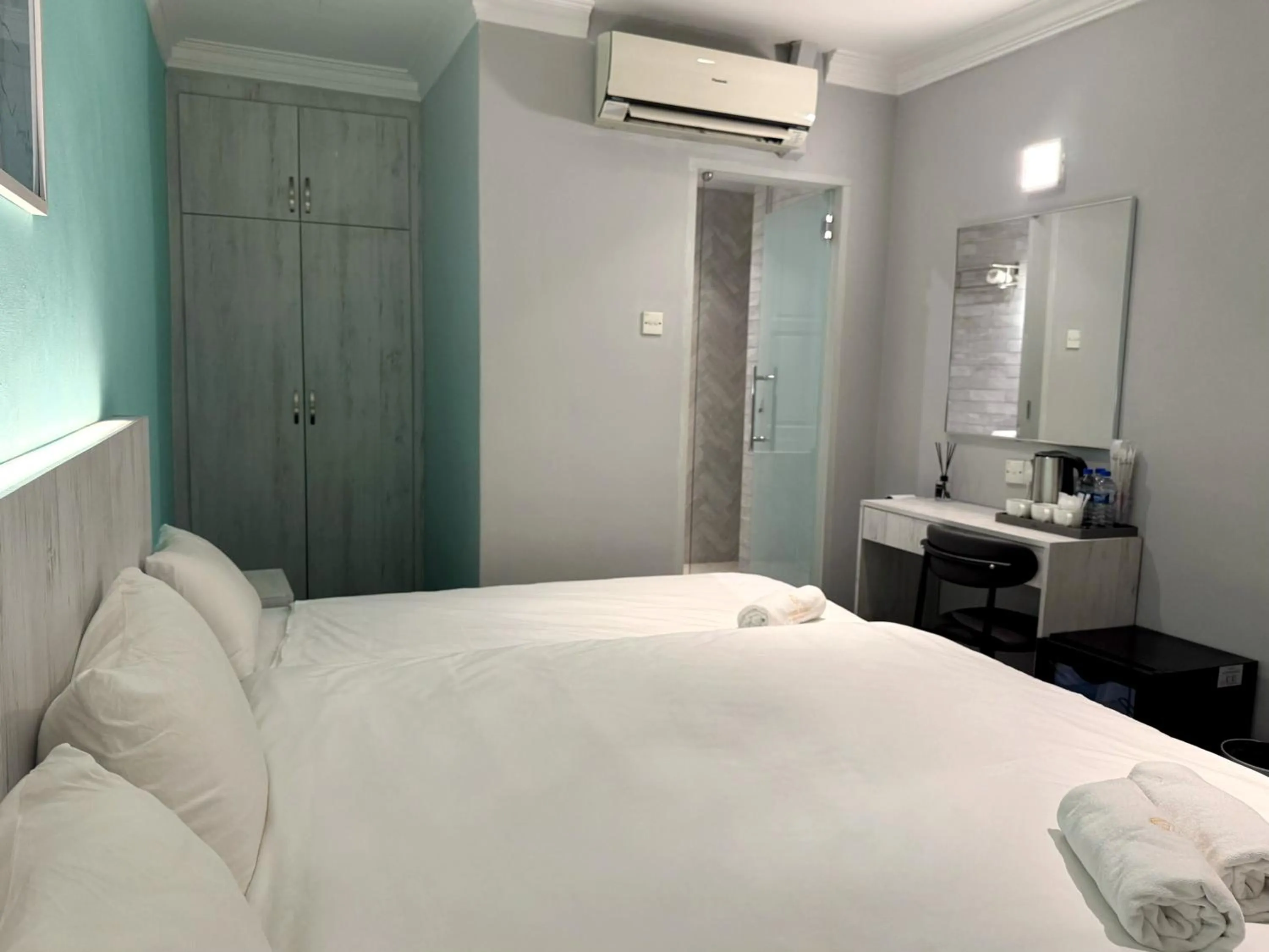 Bed in Hotel Calmo Hamilton