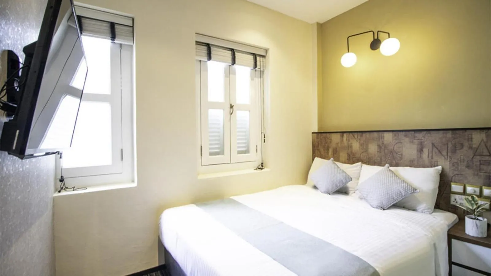 Bed in Hotel Calmo Hamilton