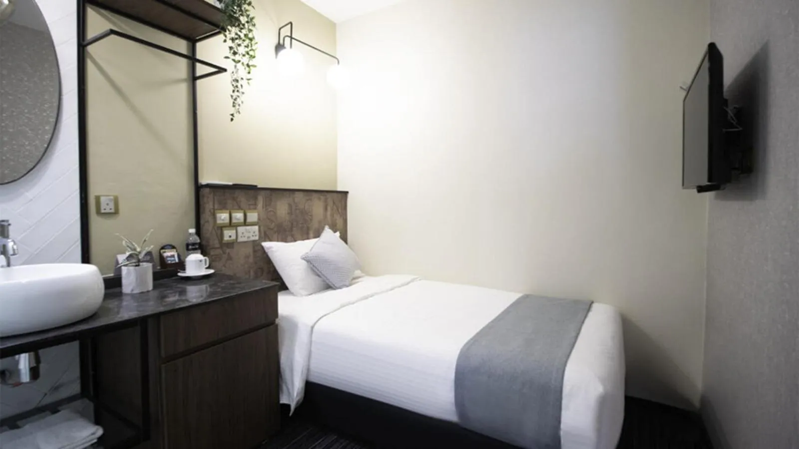 Bed in Hotel Calmo Hamilton