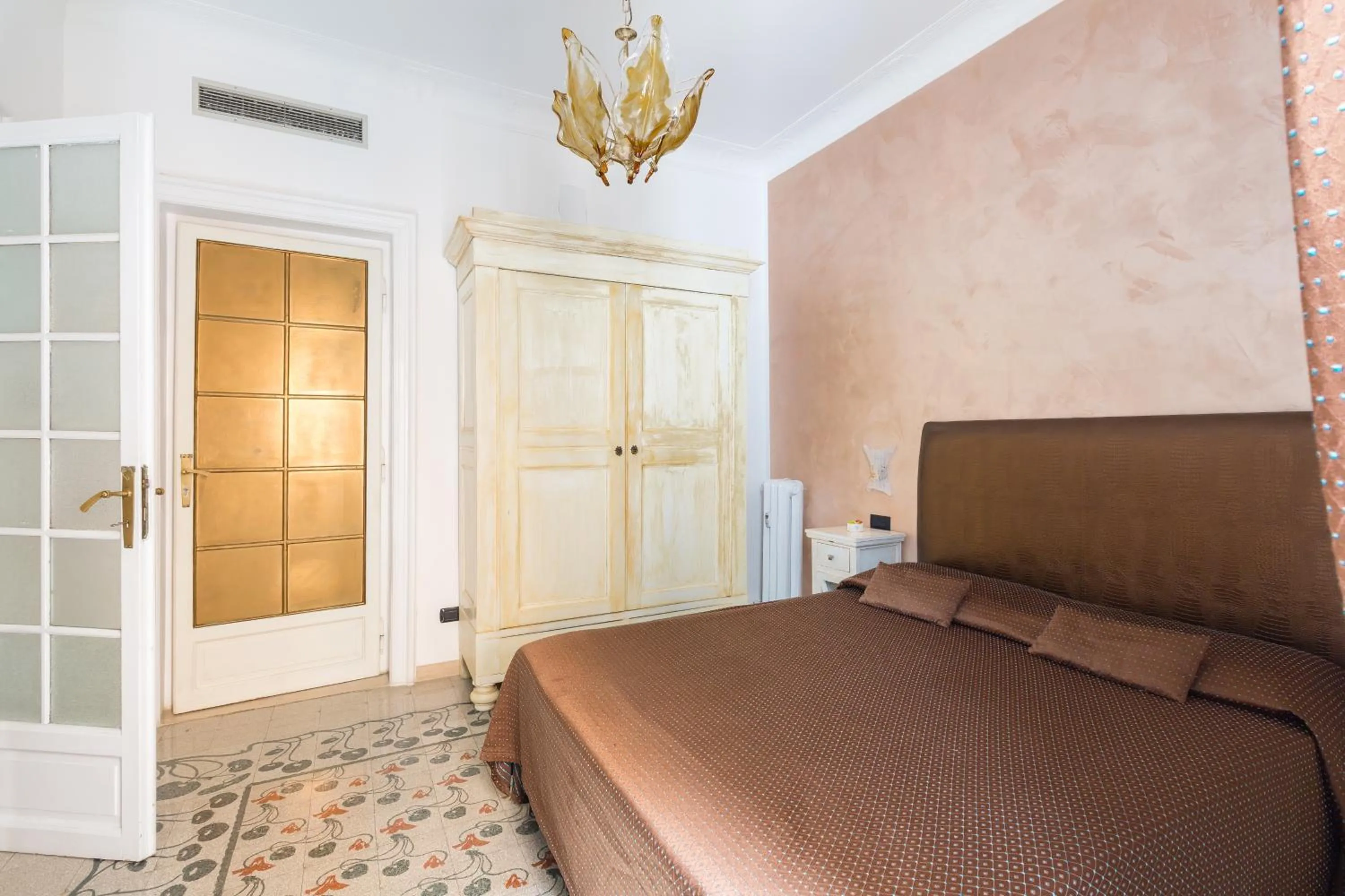 Bed in Relais Calamatta