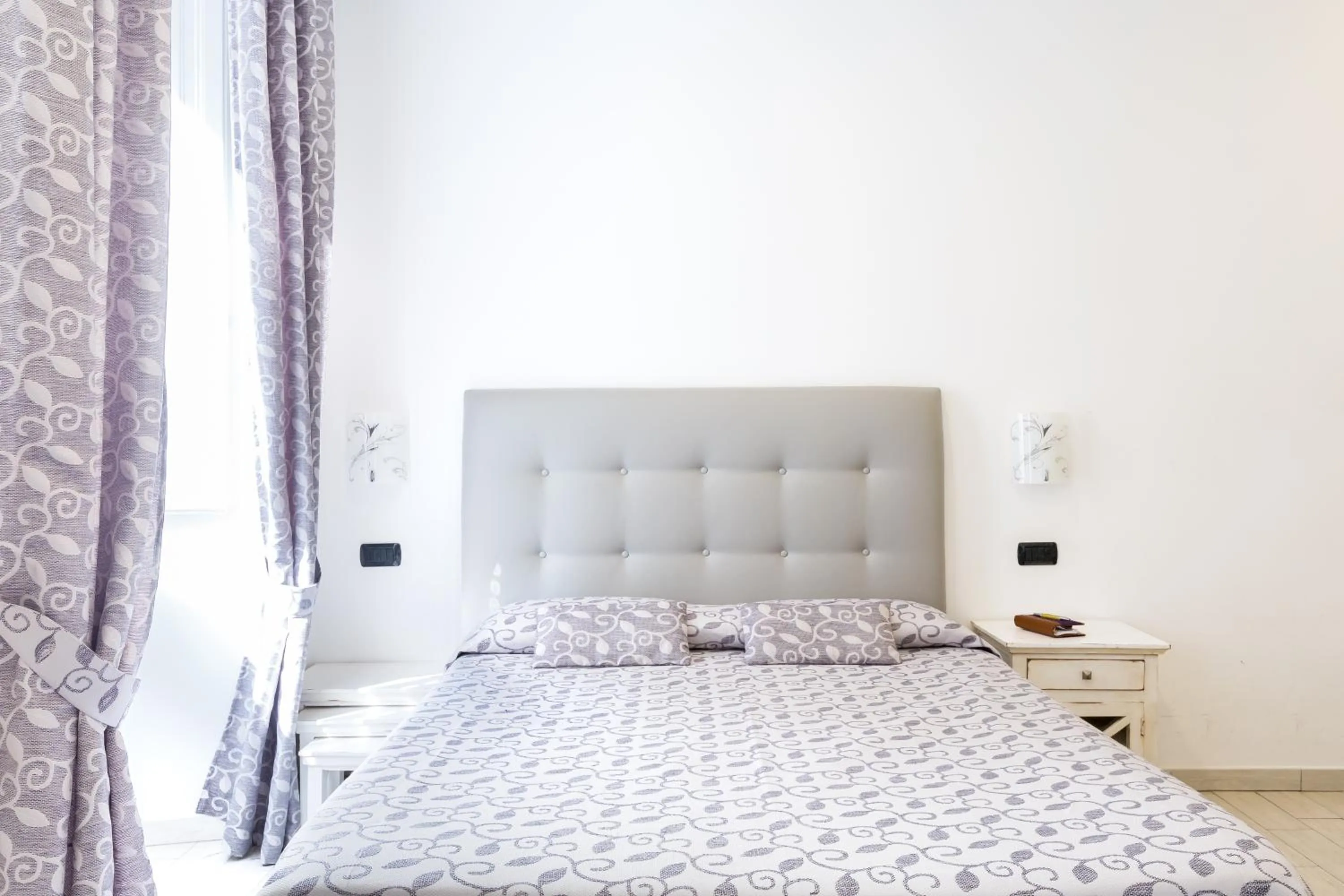 Bed in Relais Calamatta