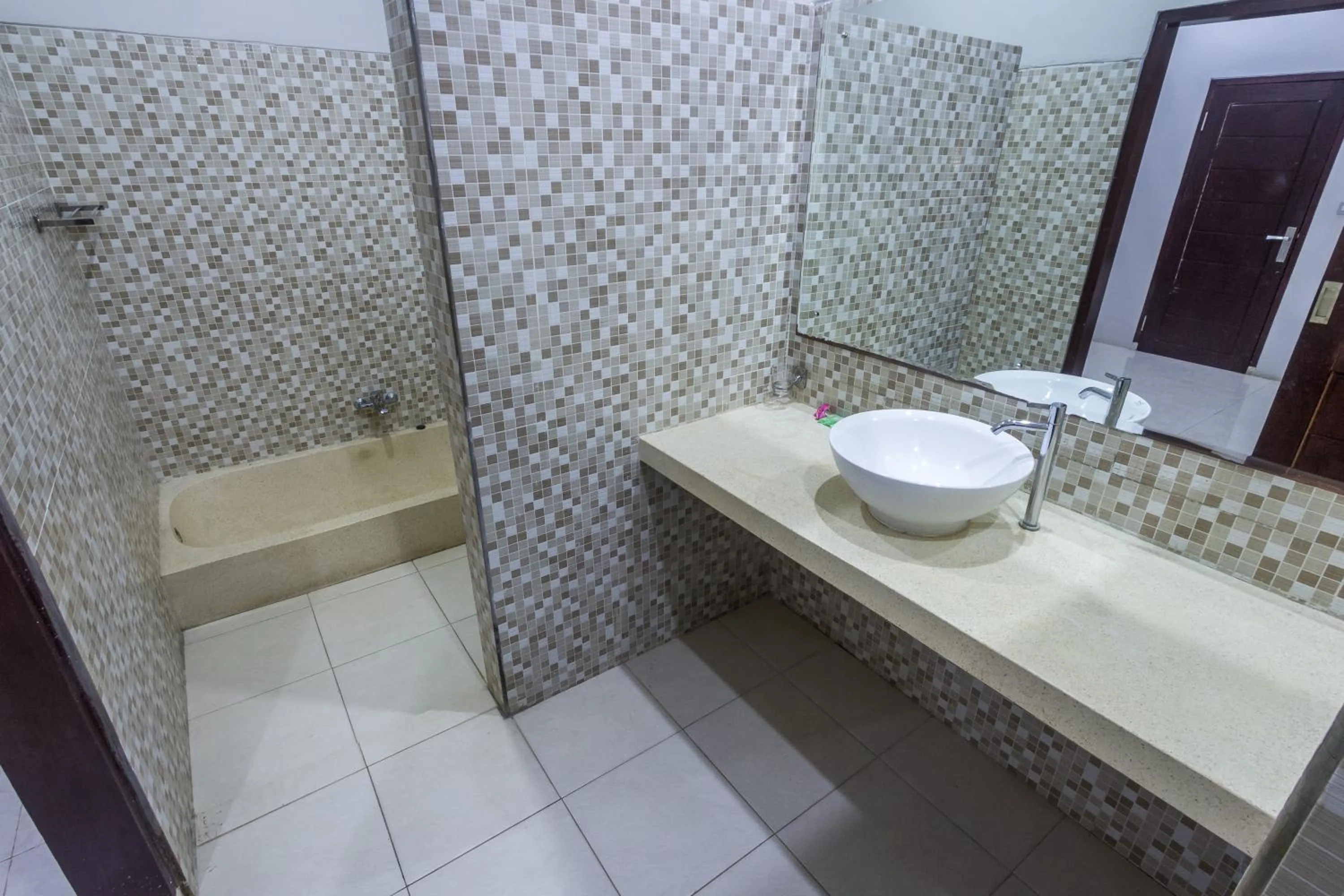 Bathroom in JM Hotel Kuta Lombok