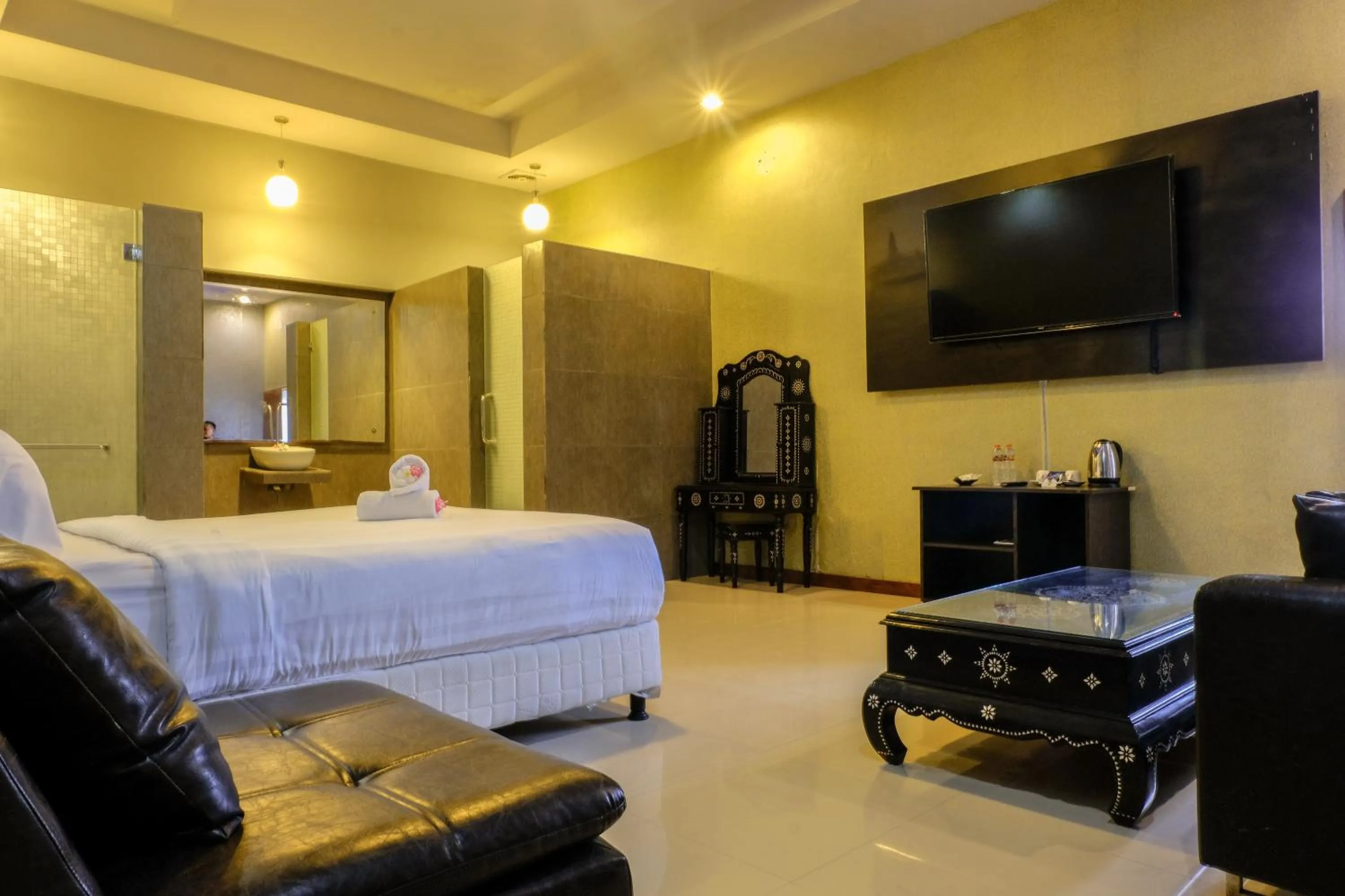 Photo of the whole room, Bed in JM Hotel Kuta Lombok