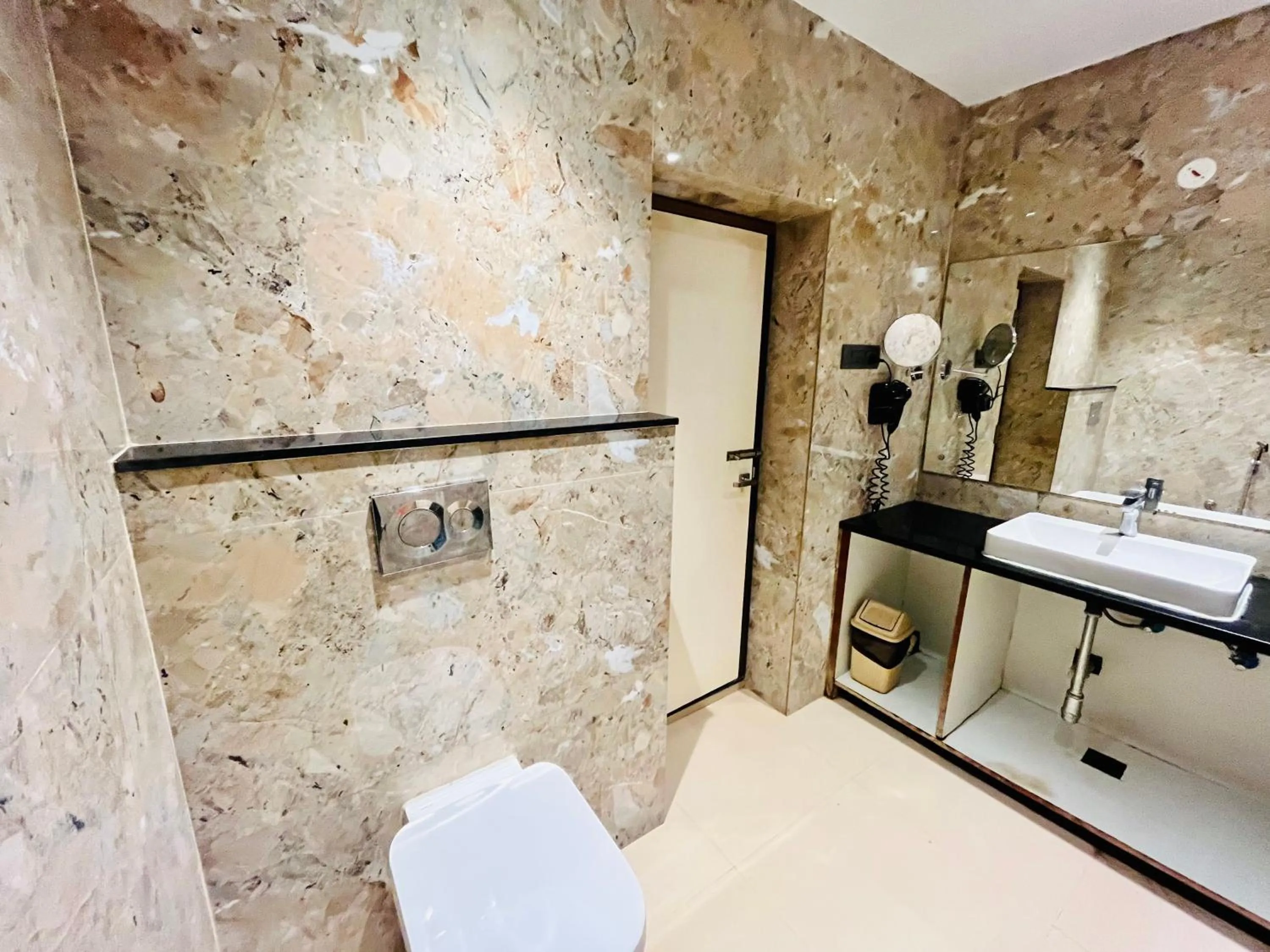 Shower in Shankar Bhavan By Vinayak Hotels