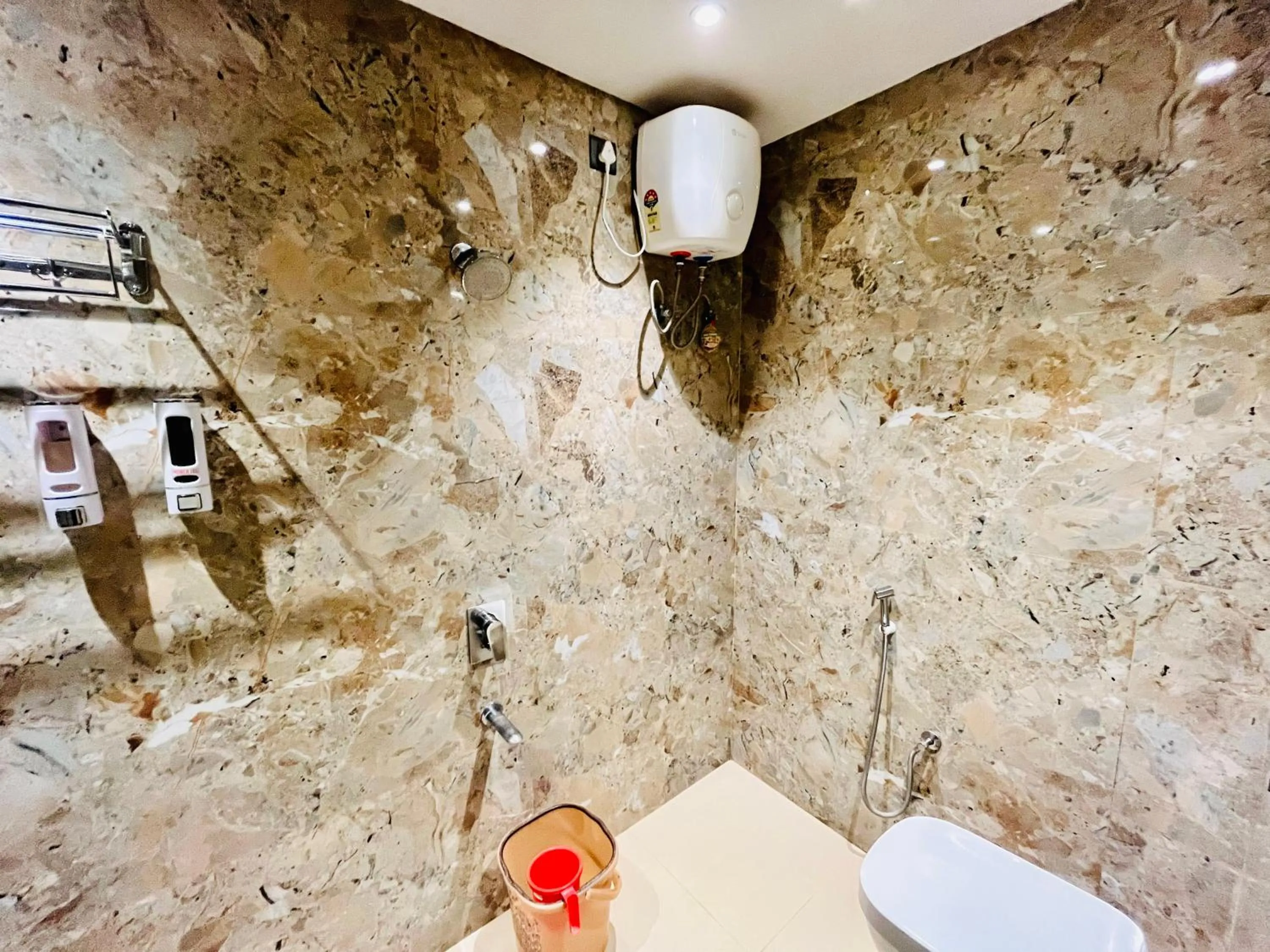 Shower in Shankar Bhavan By Vinayak Hotels