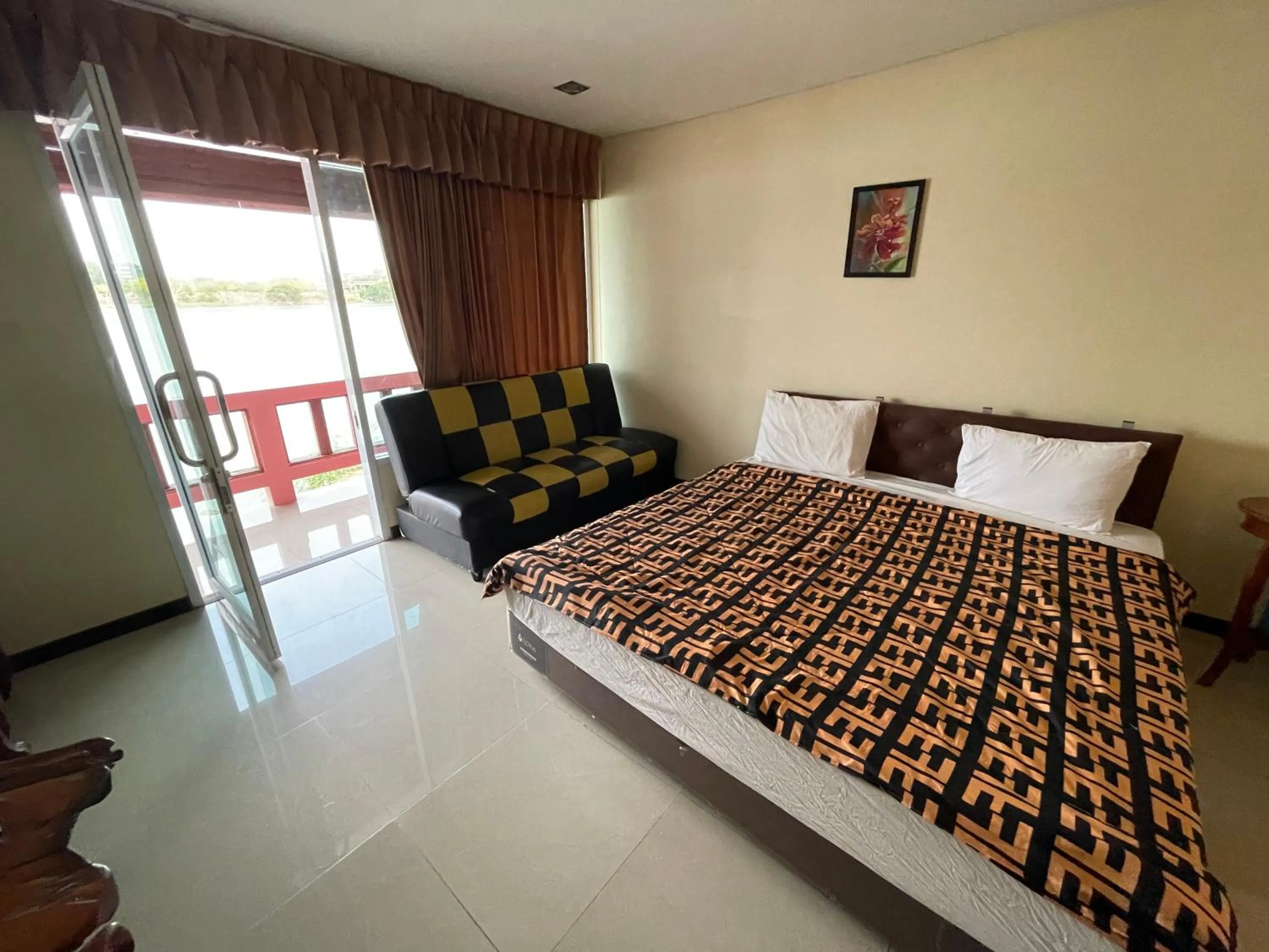 Bed in Techno Riverview Resort