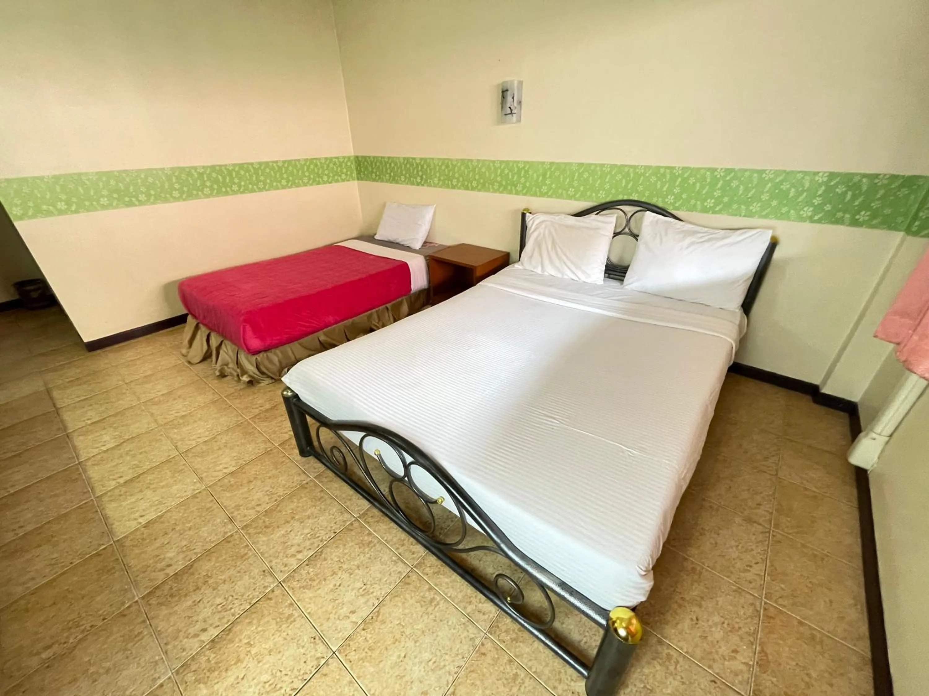 Bed in Techno Riverview Resort