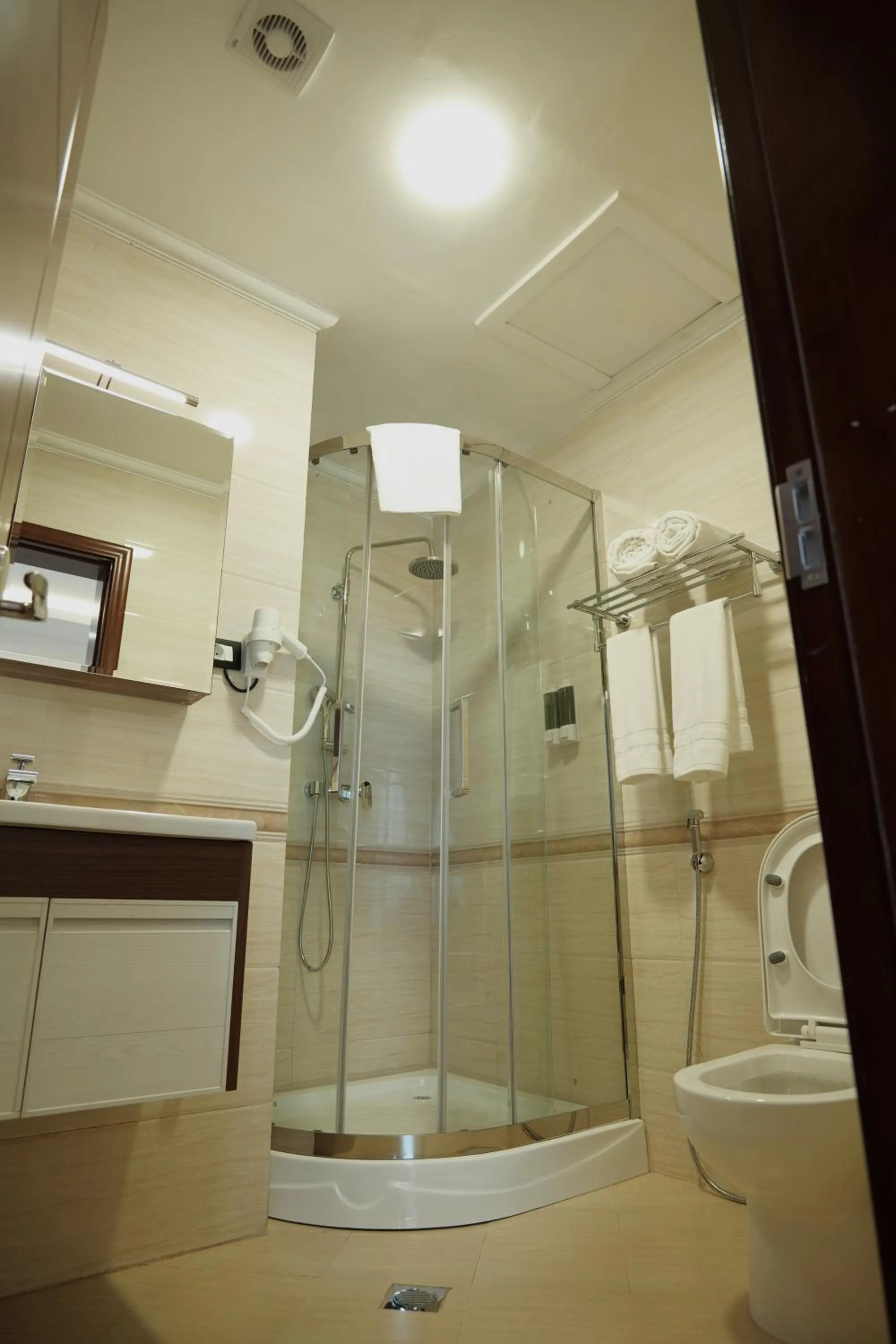 Shower in Crescent International Hotel