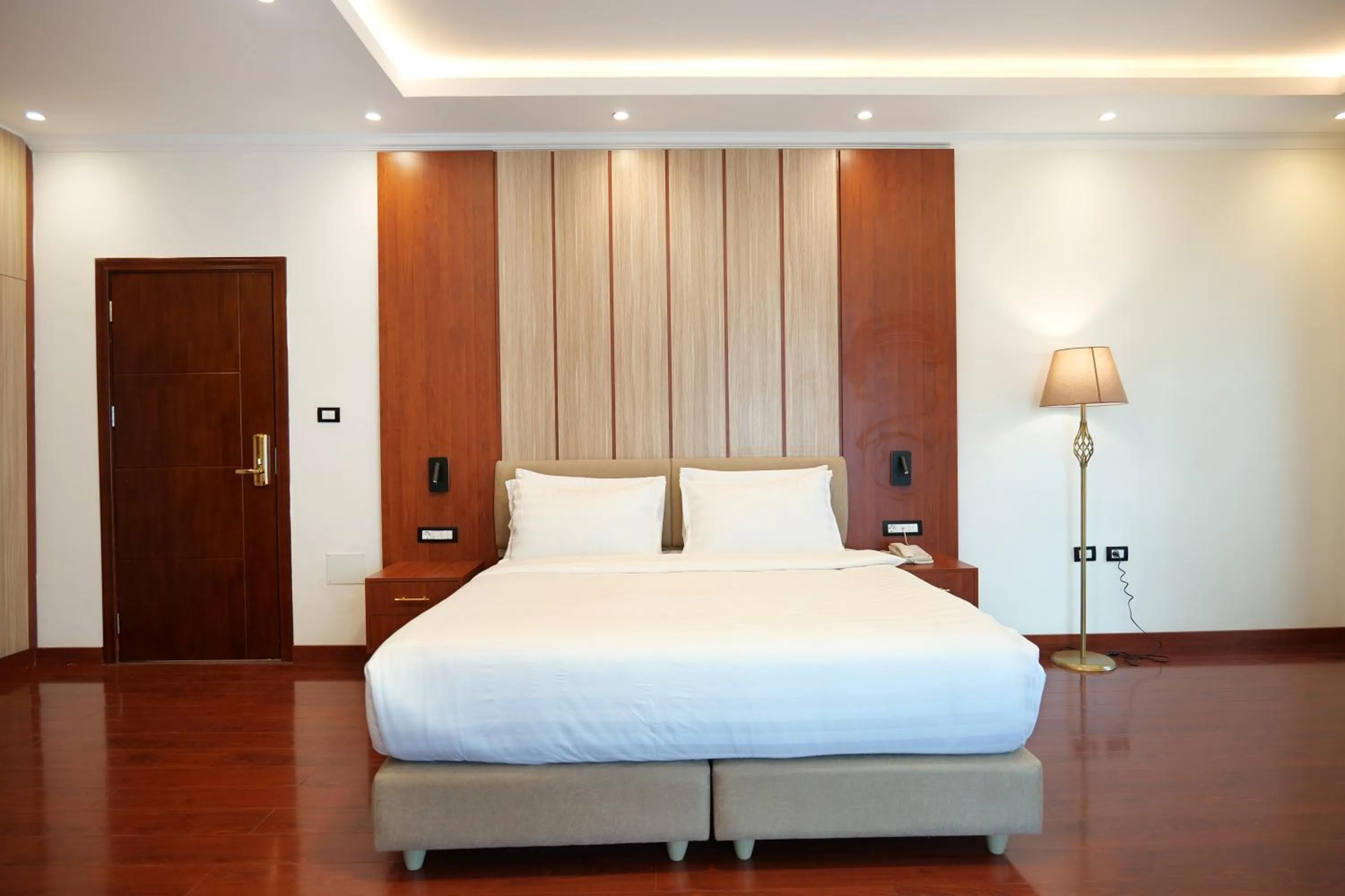 Bed in Crescent International Hotel