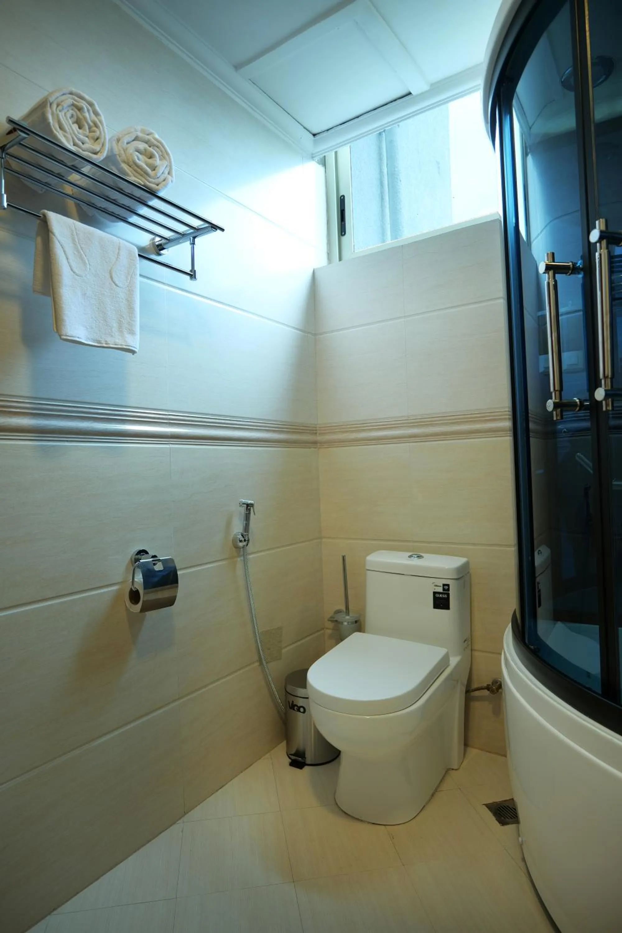 Toilet in Crescent International Hotel