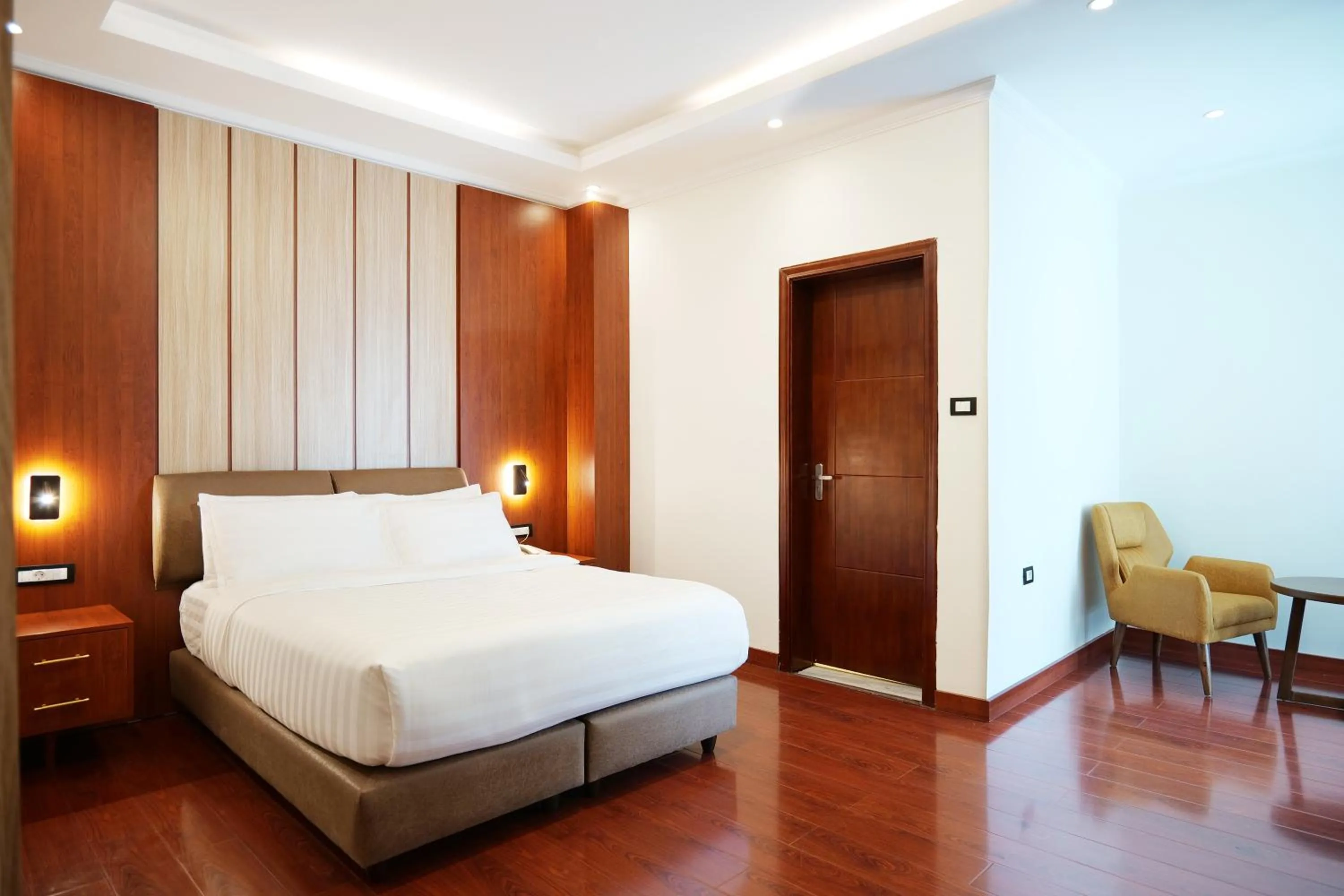 Bed in Crescent International Hotel