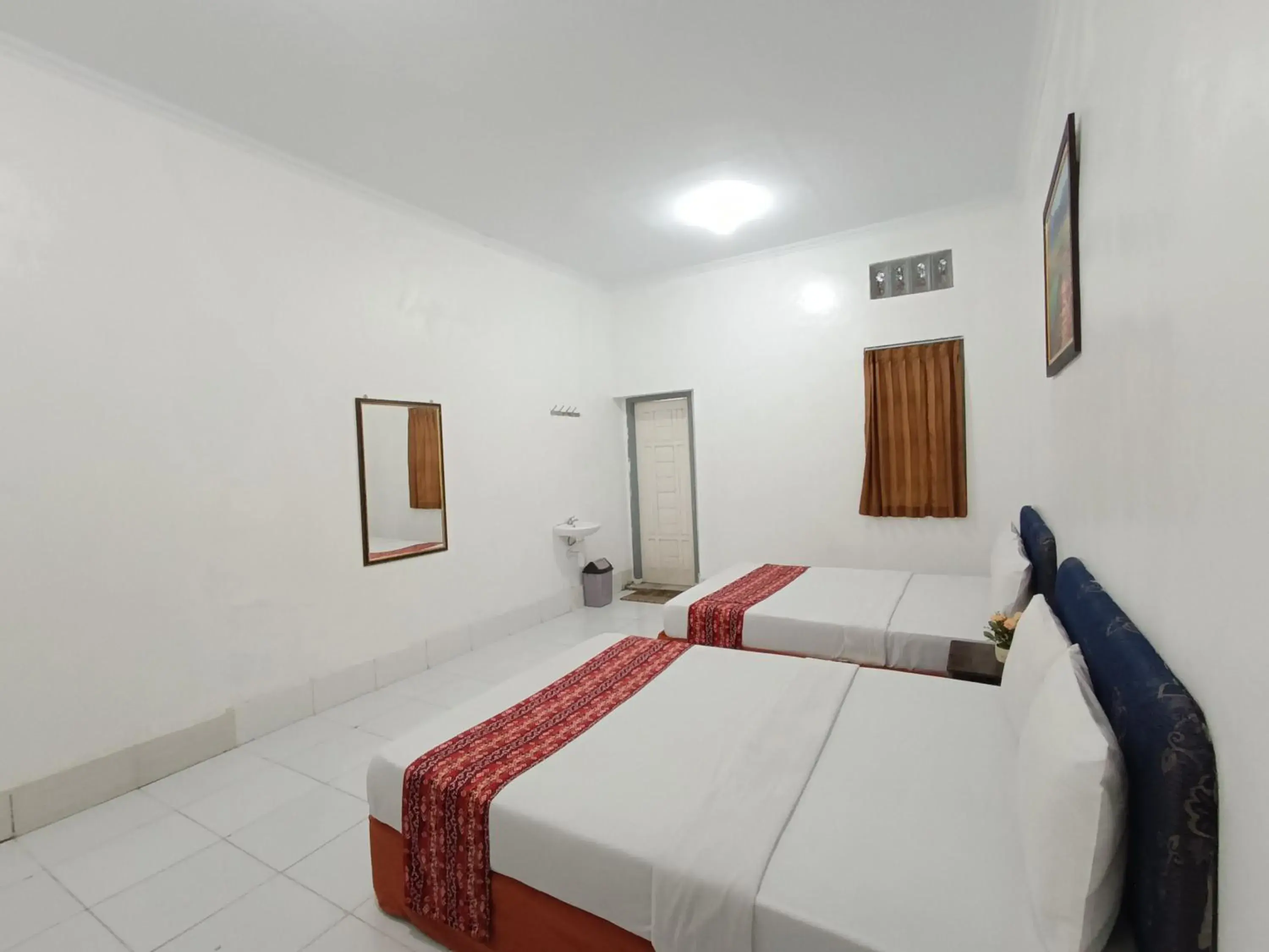 Family Suite in Hotel STIPRAM Kaliurang Yogyakarta Family Suite in Hotel STIPRAM Kaliurang Yogyakarta