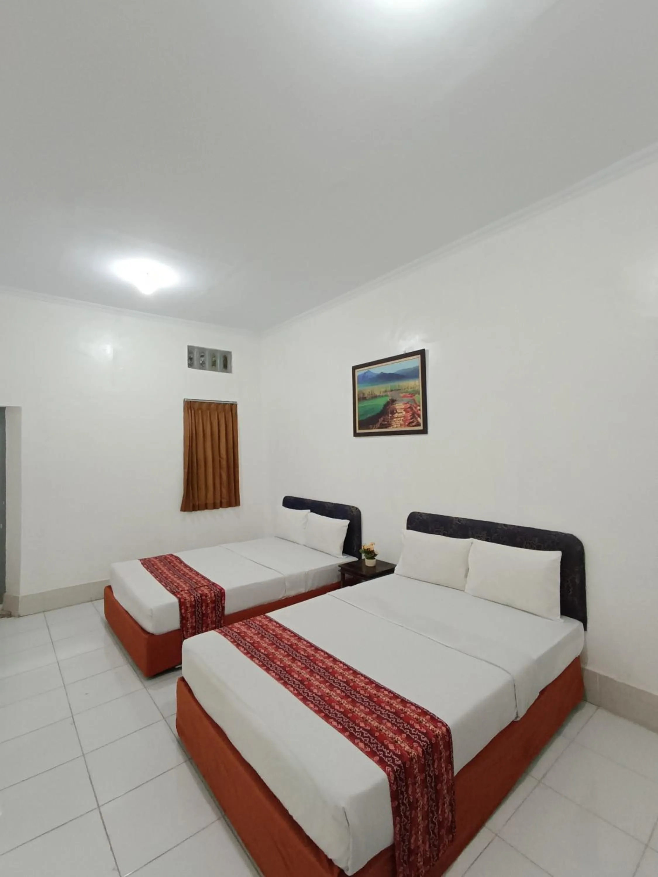 Bed in Hotel STIPRAM Kaliurang Yogyakarta