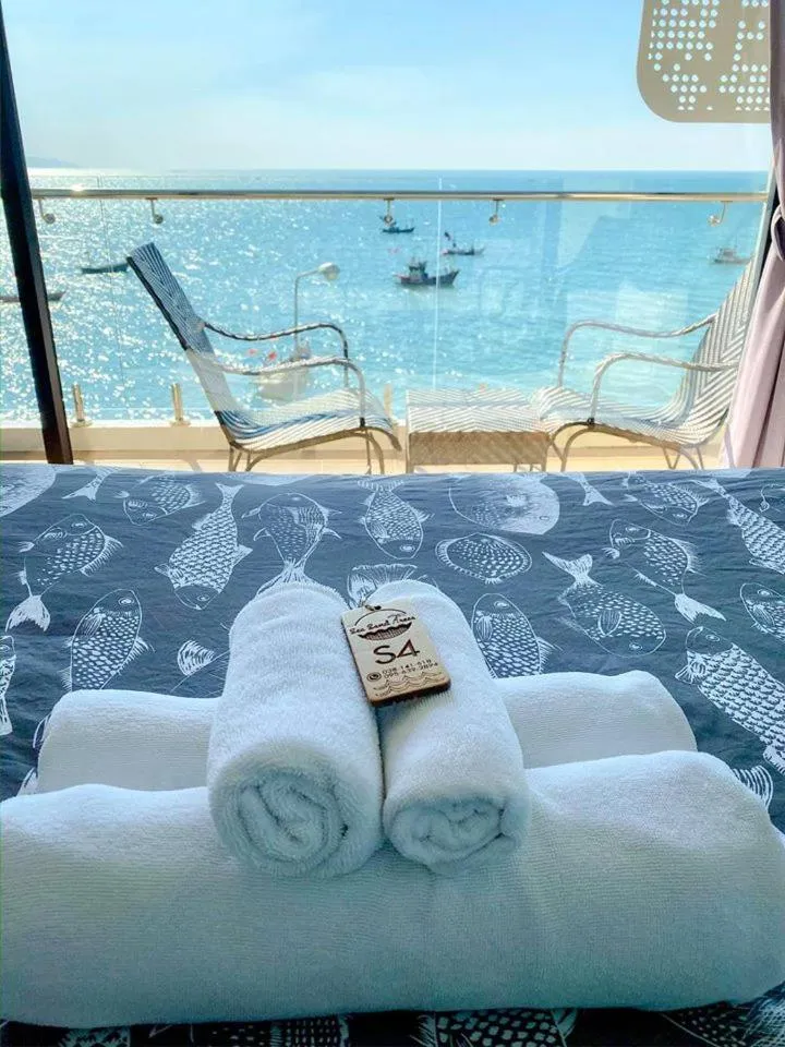 Bed in Sea Sand Trees