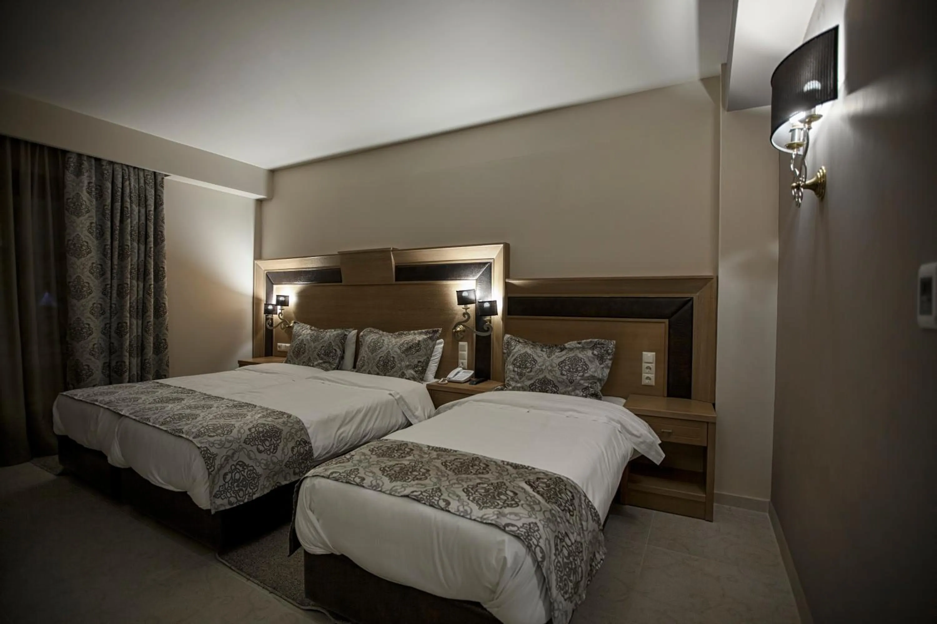 Bed in Grand Meteora Hotel