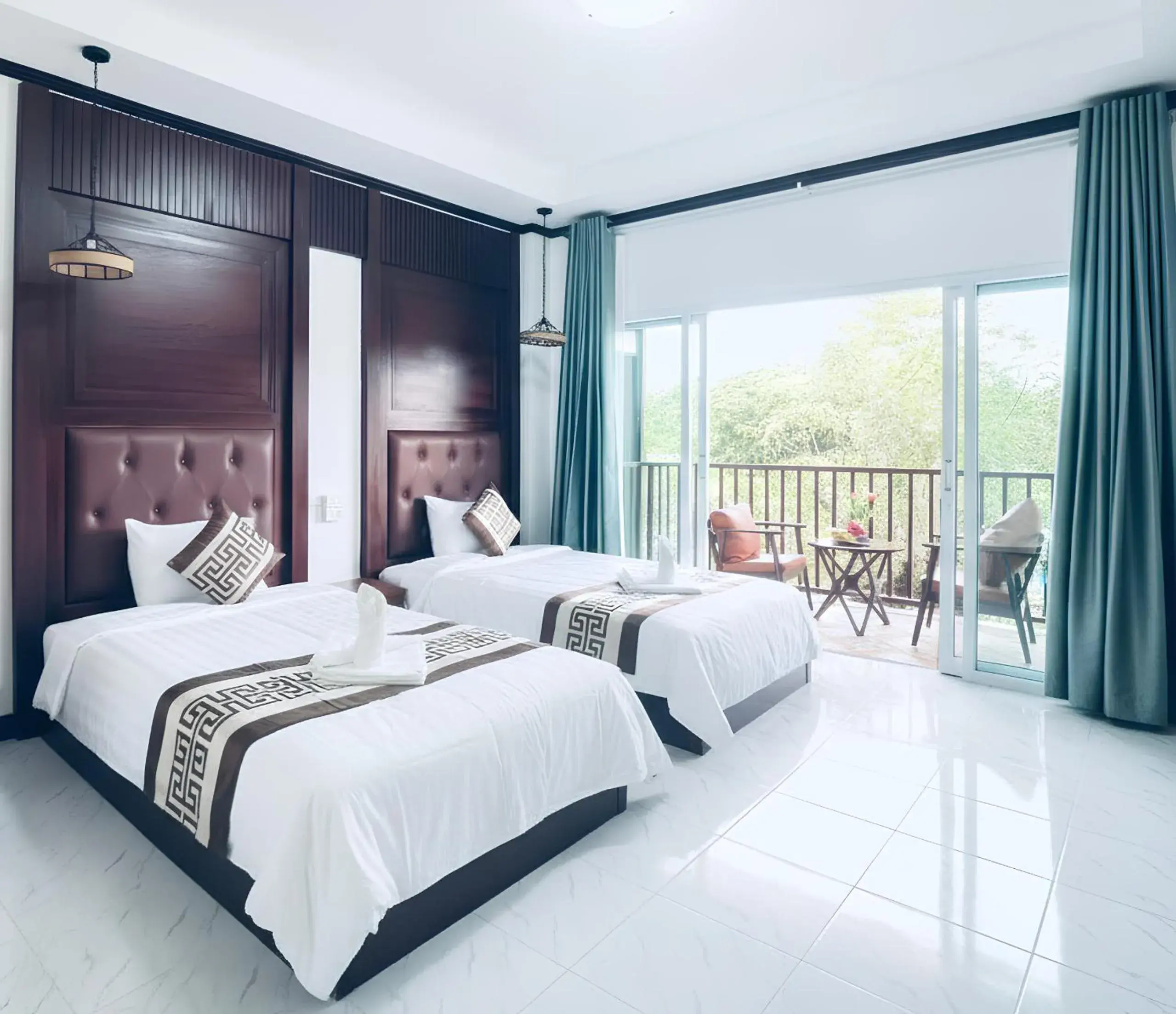 Twin Room with Balcony in Intimate Riverside Resort Vang Vieng Twin Room with Balcony in Intimate Riverside Resort Vang Vieng