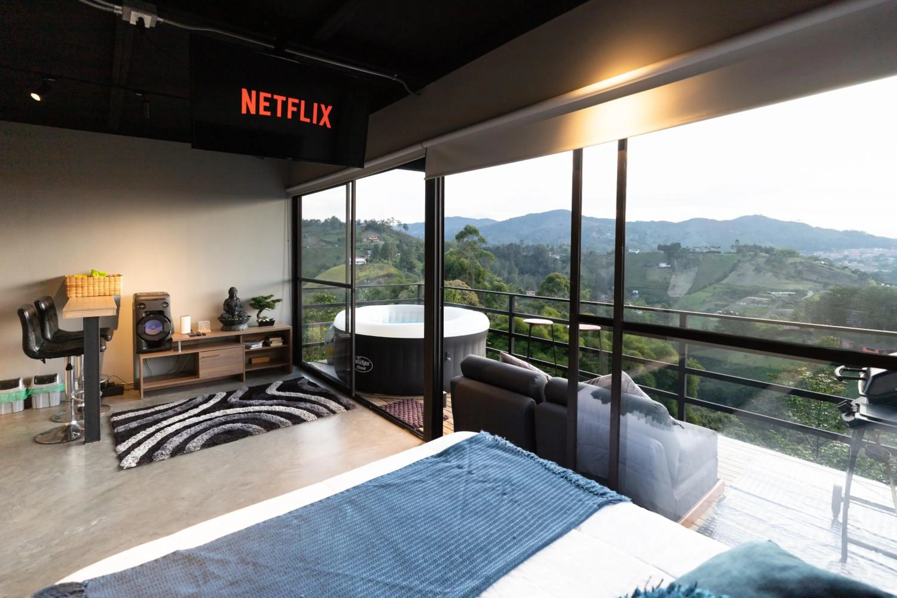 Communal lounge/ TV room in Roots Eco House