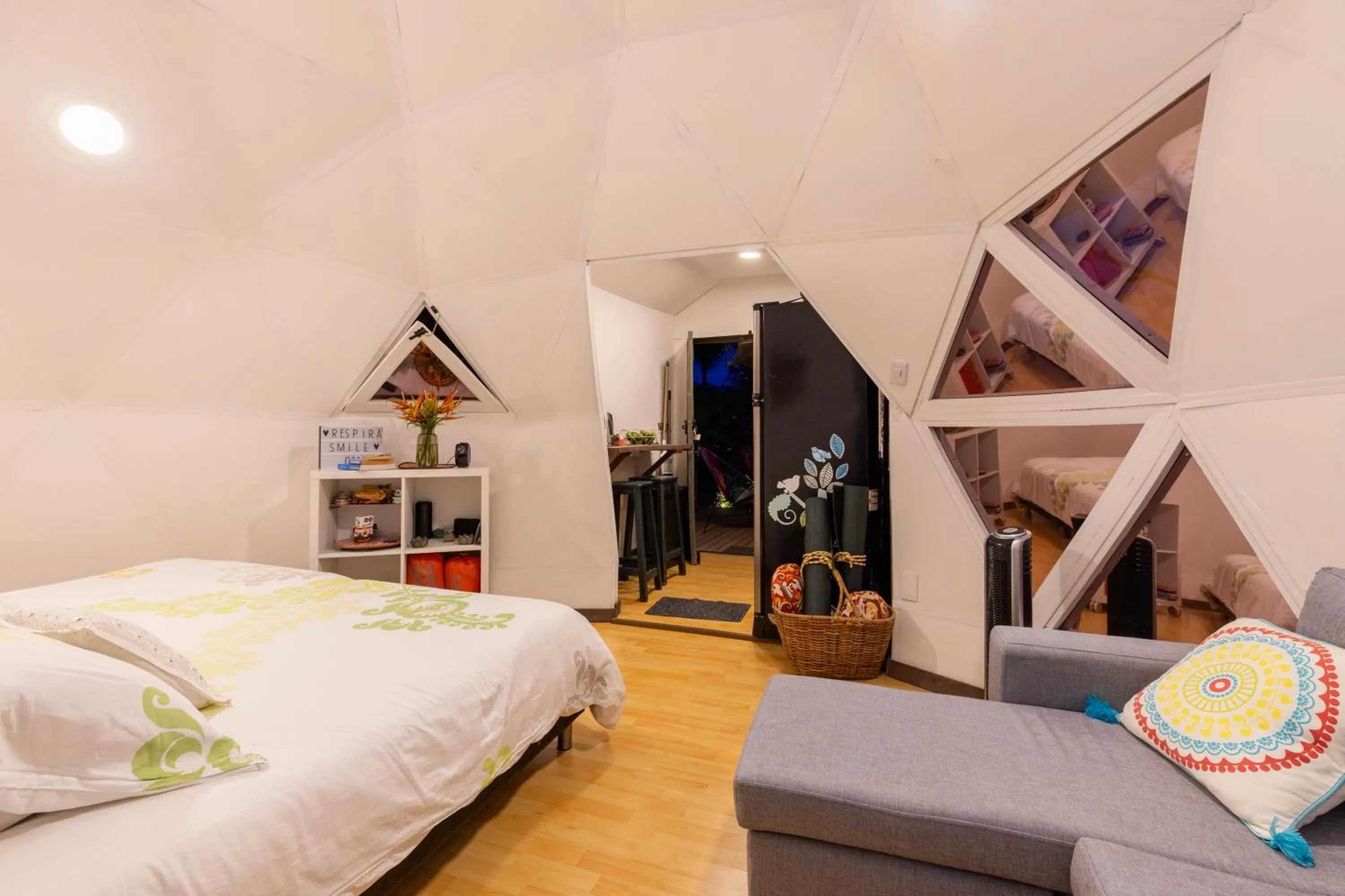 Communal lounge/ TV room, Bed in Roots Eco House