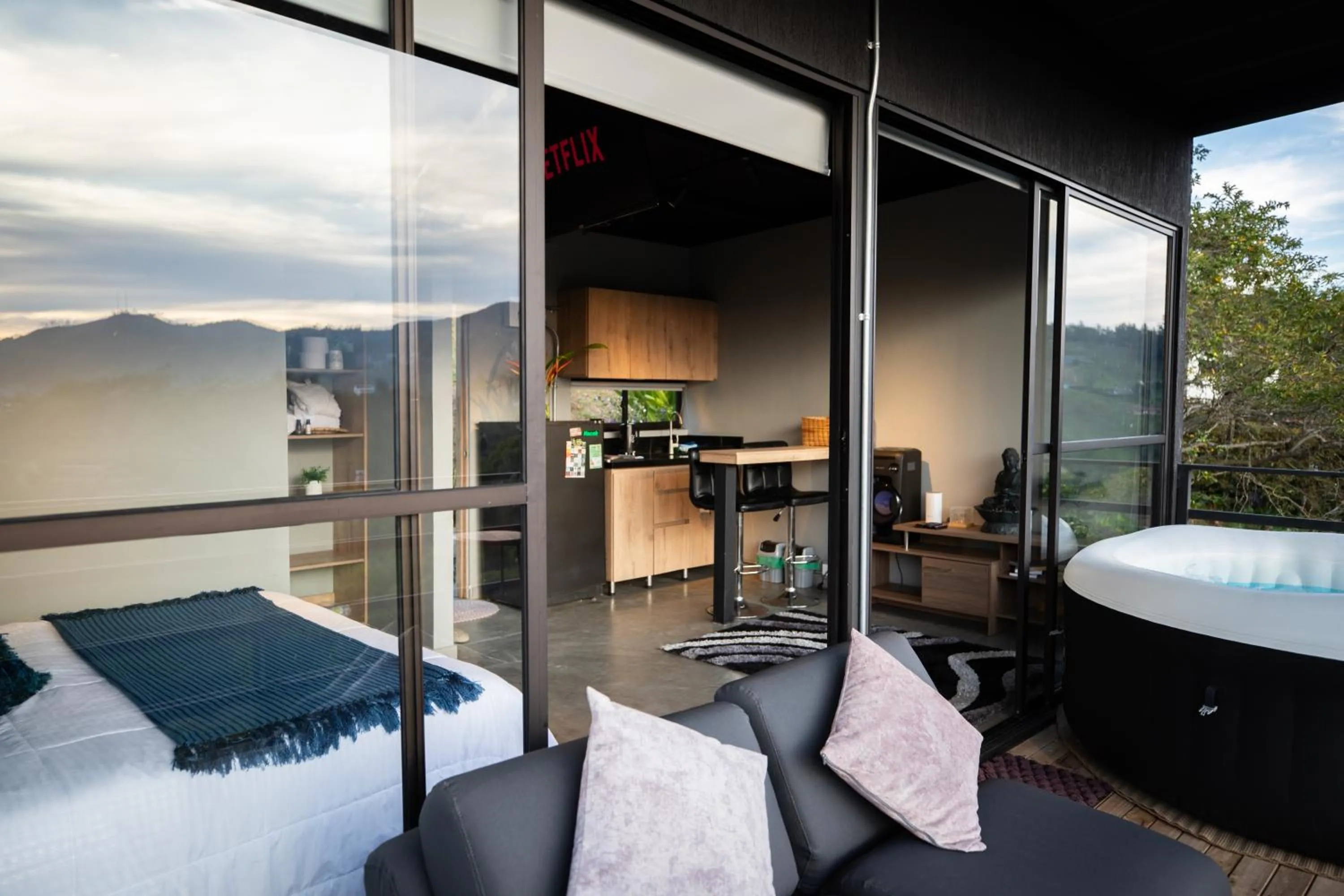 Communal lounge/ TV room in Roots Eco House