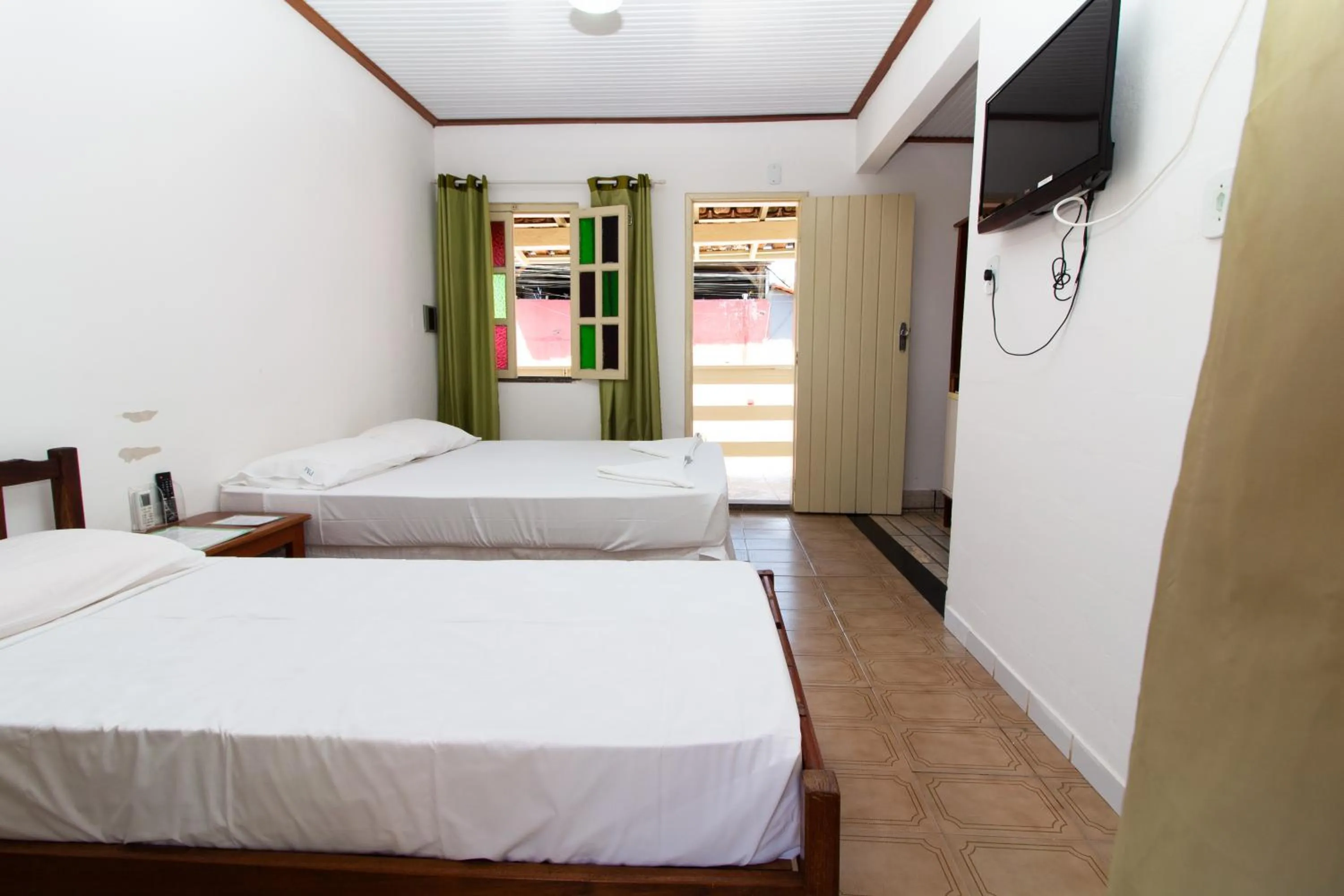 Bed in Pousada Manga Rosa- Arraial