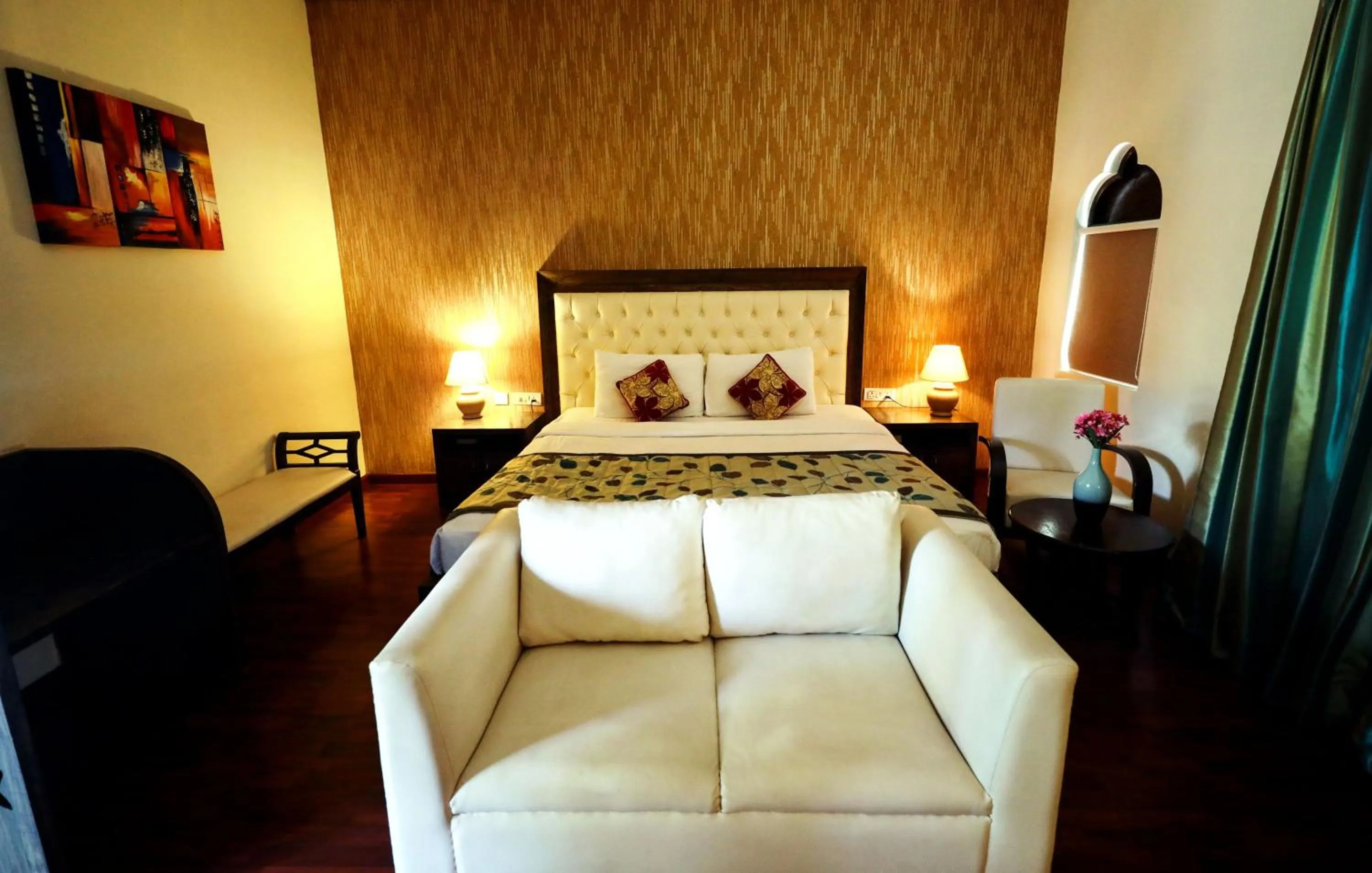 Photo of the whole room in Blue Ocean The Fern Resort & Spa Ganpatipule