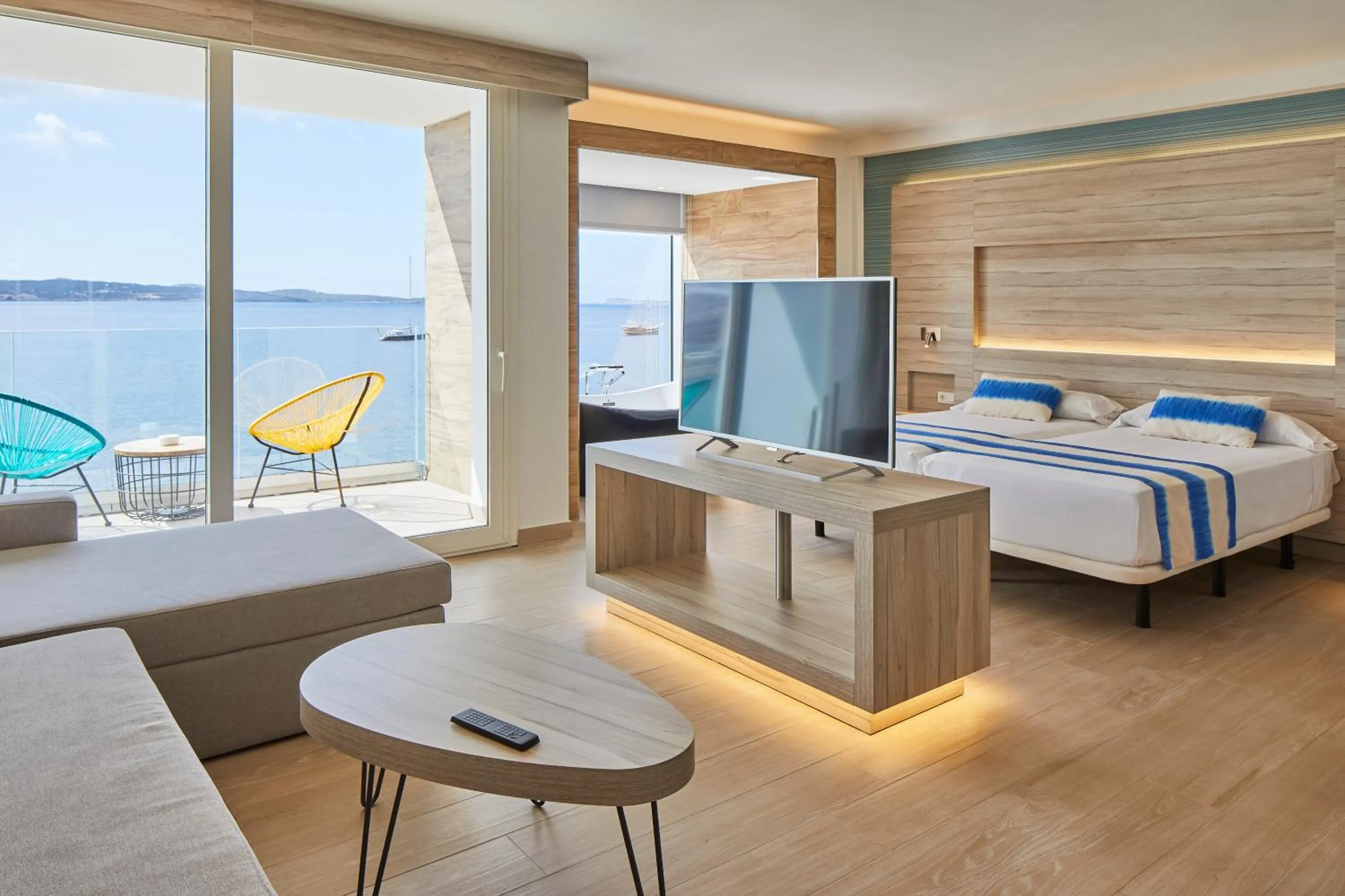Living room, Bed in Sol Bahía Ibiza Suites