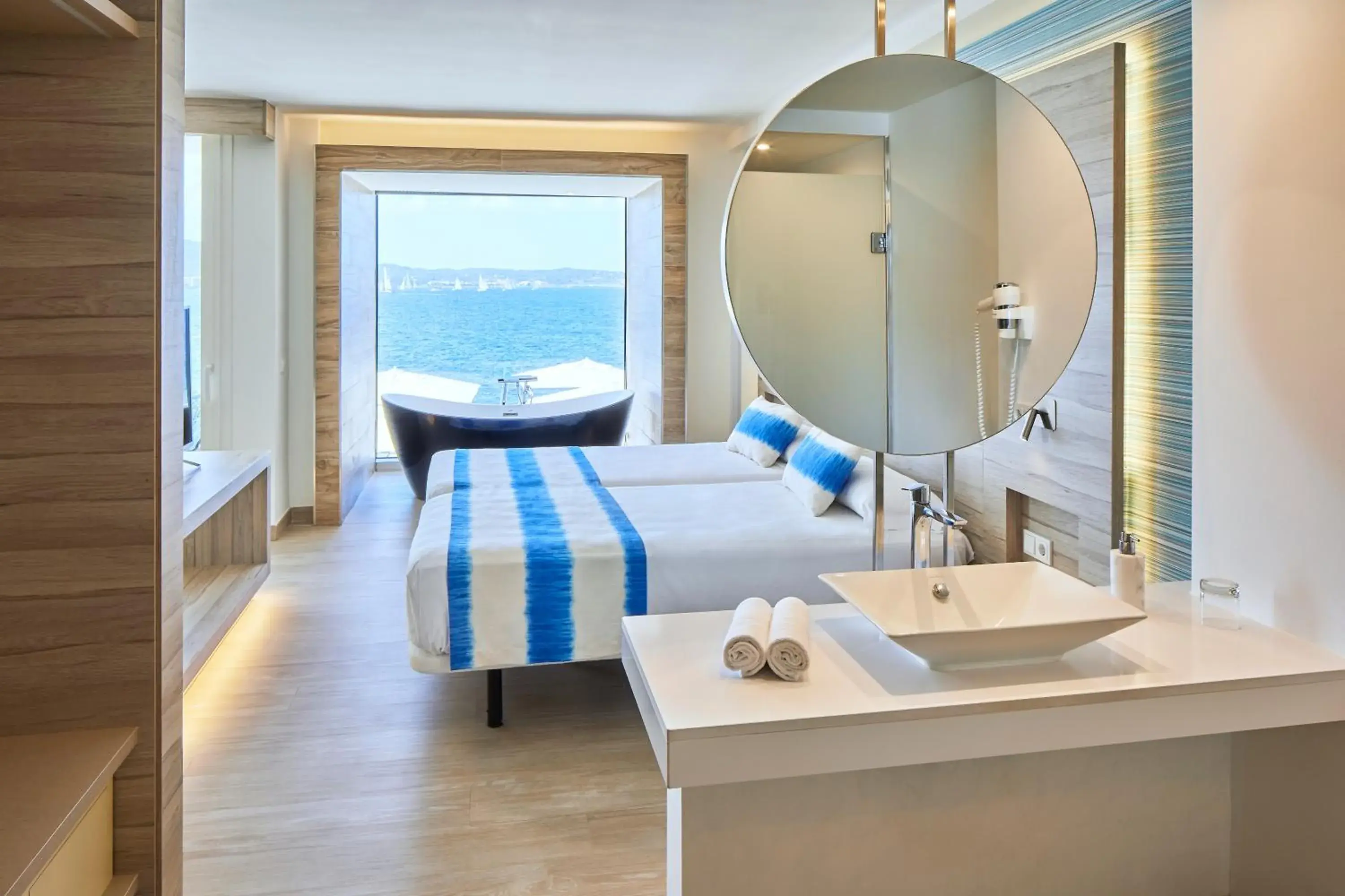 Photo of the whole room, Bed in Sol Bahía Ibiza Suites Photo of the whole room, Bed in Sol Bahía Ibiza Suites