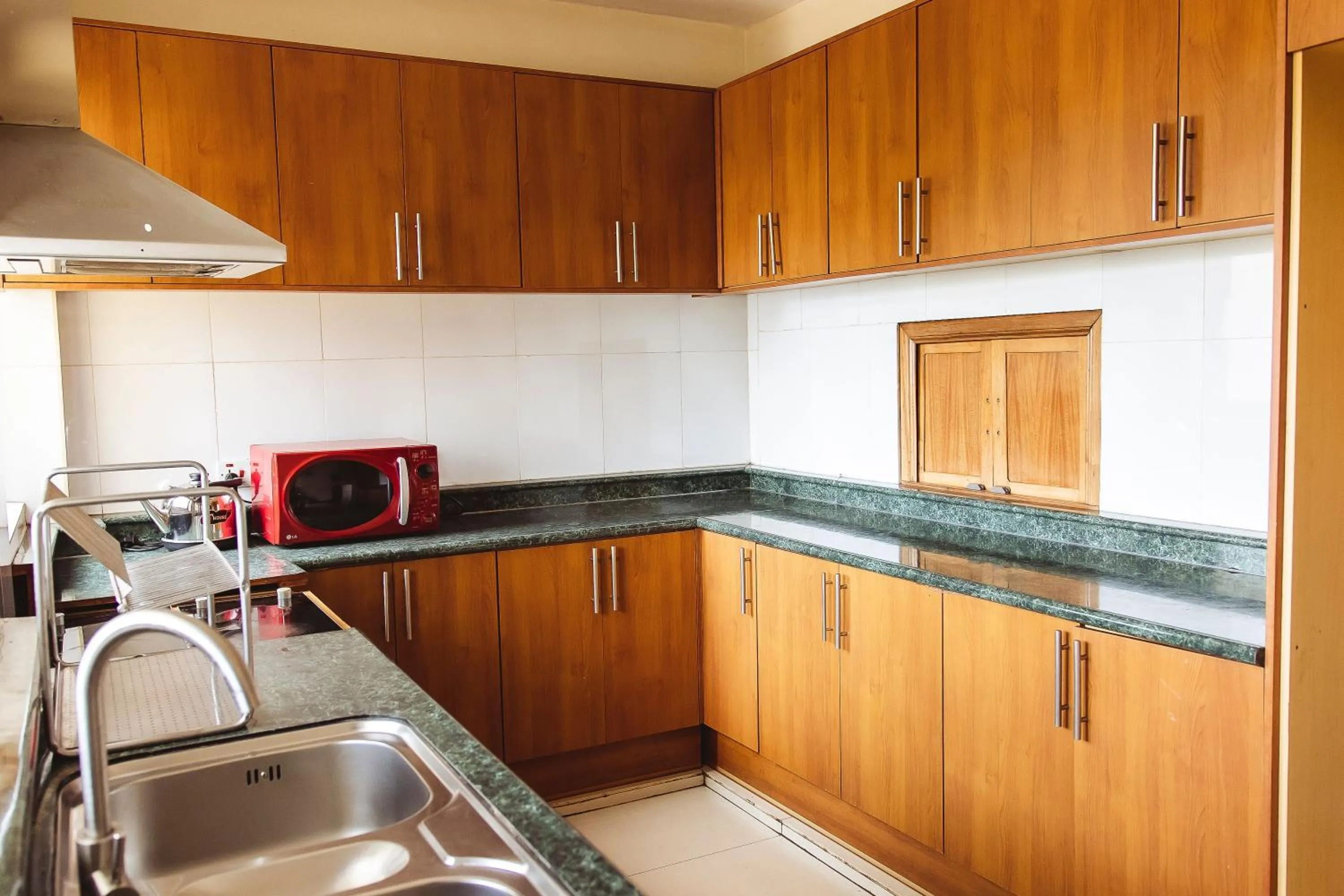 Kitchen or kitchenette in Highlands Apartment