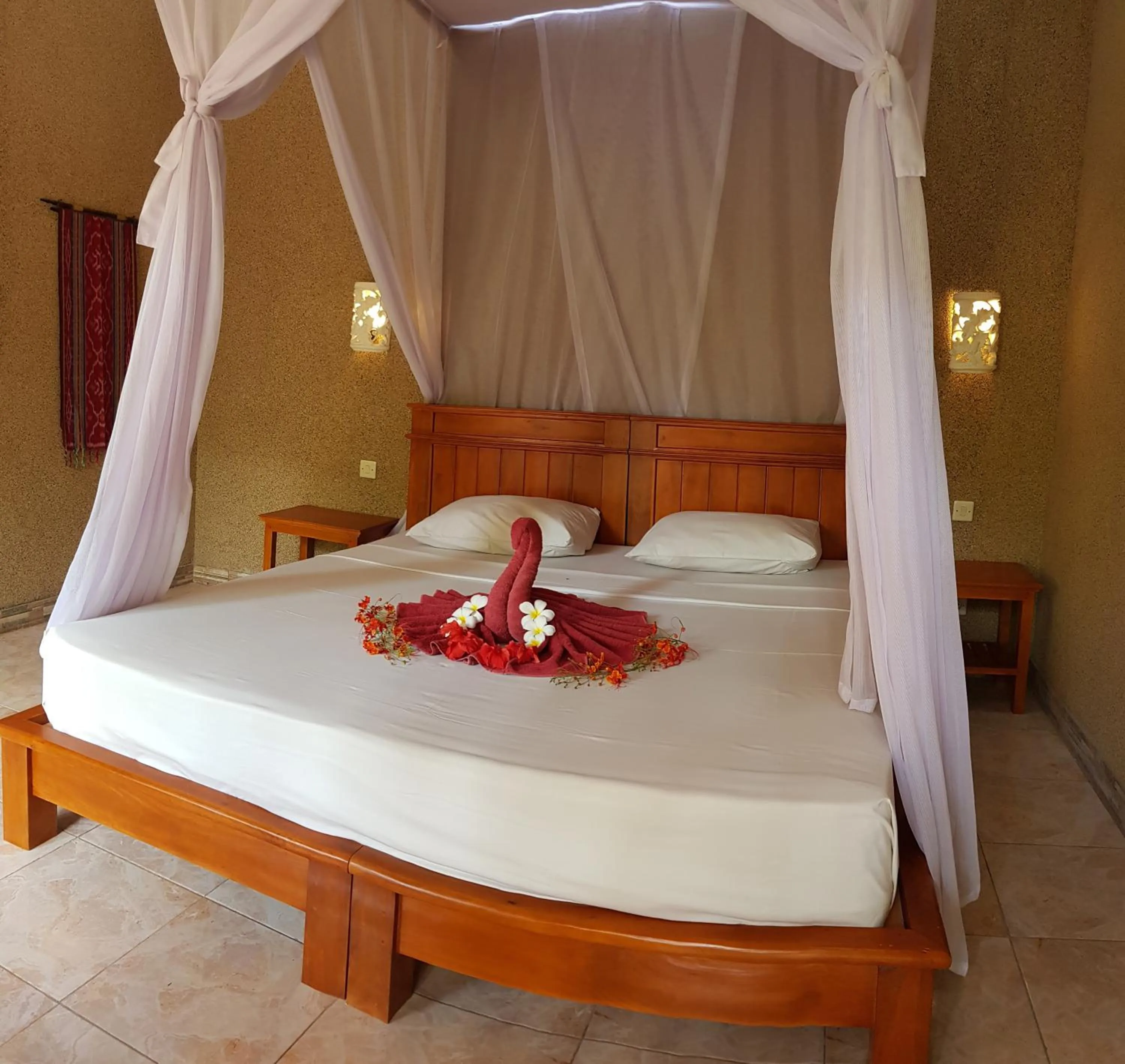 Bed in Mango Tree Inn