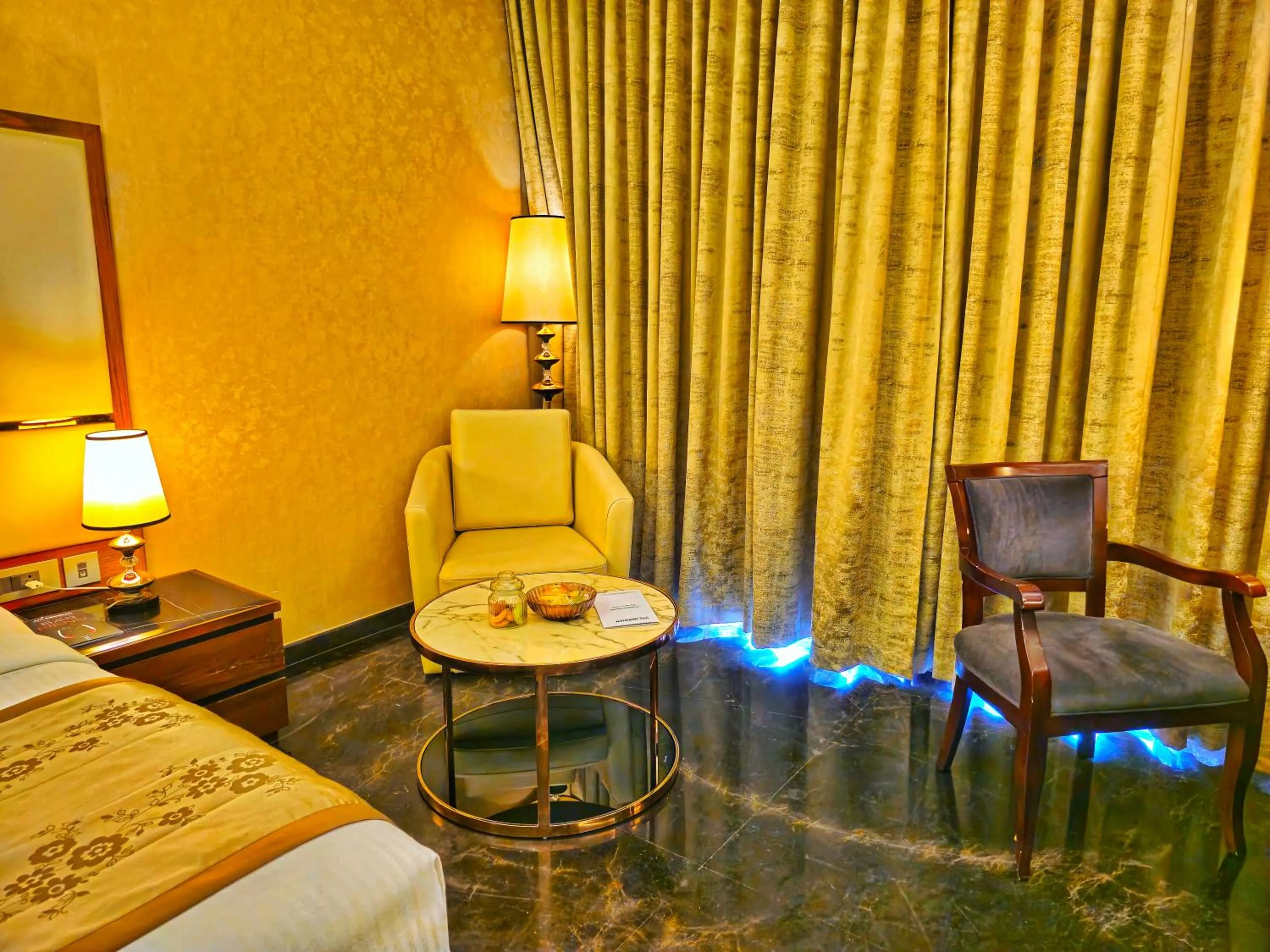 Seating area, Bed in UVA Meridian Bay Resort & Spa