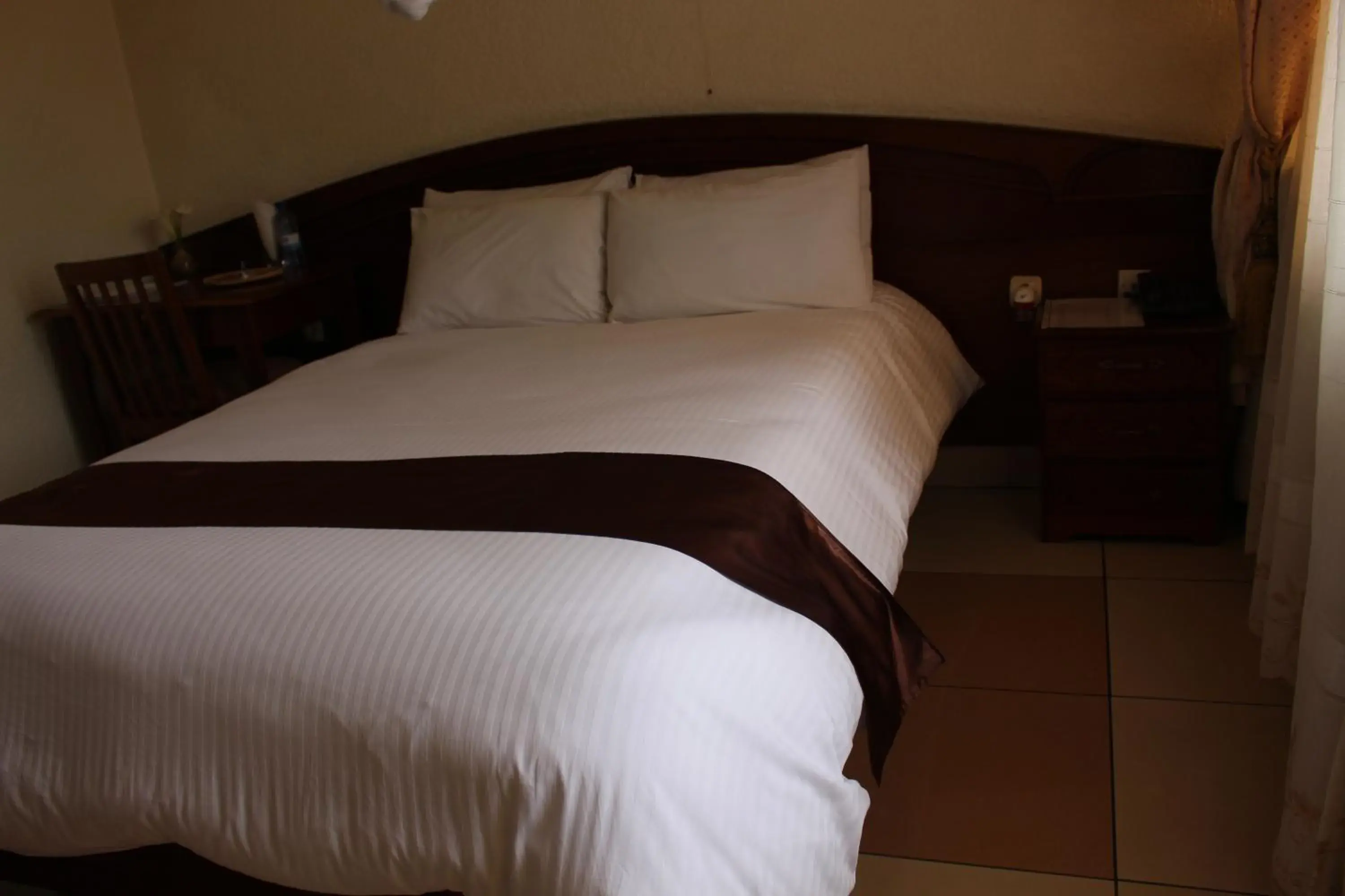 Single Room with Balcony - single occupancy in Virunga Hotel Single Room with Balcony - single occupancy in Virunga Hotel
