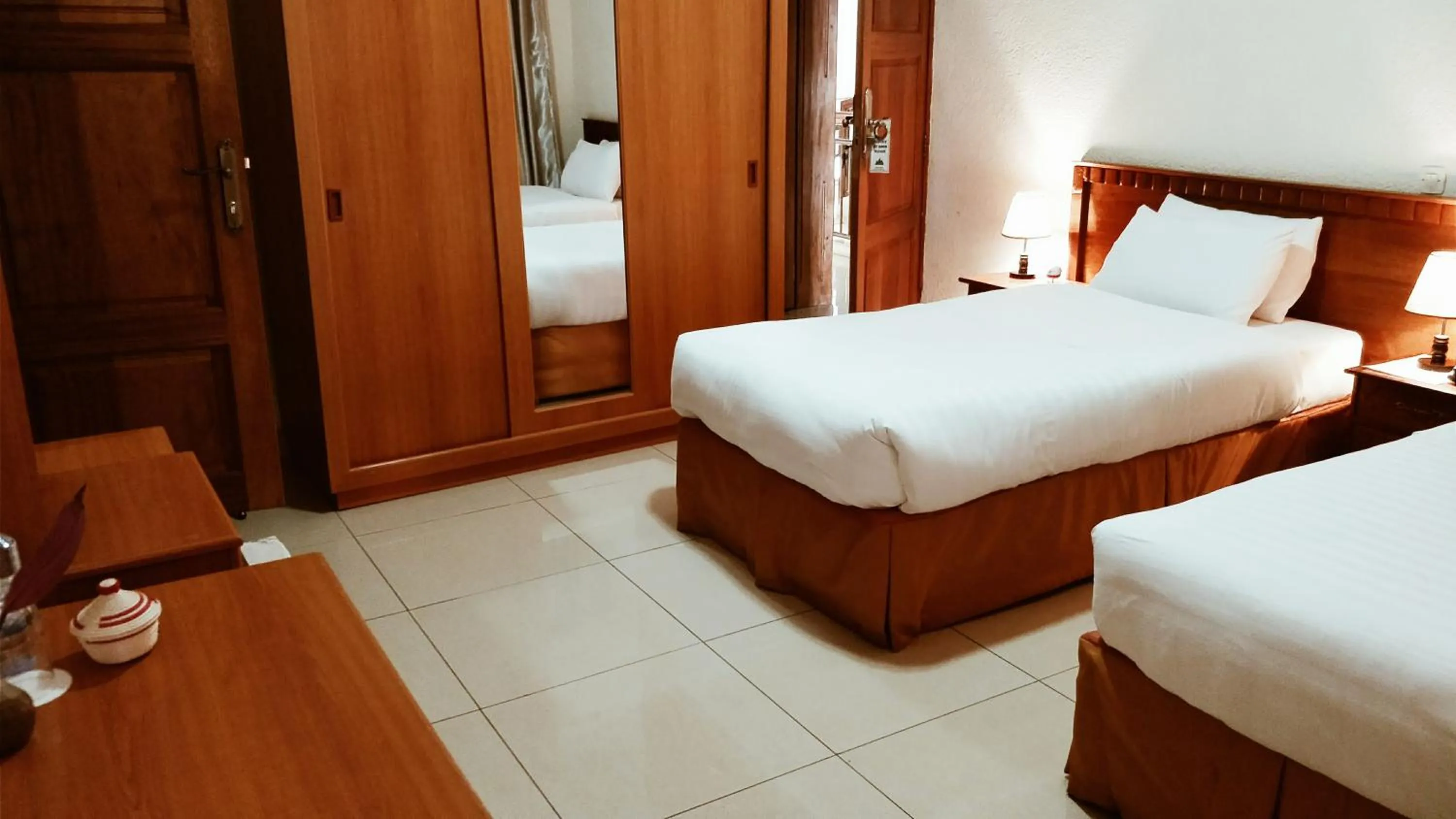 Bedroom, Bed in Virunga Hotel