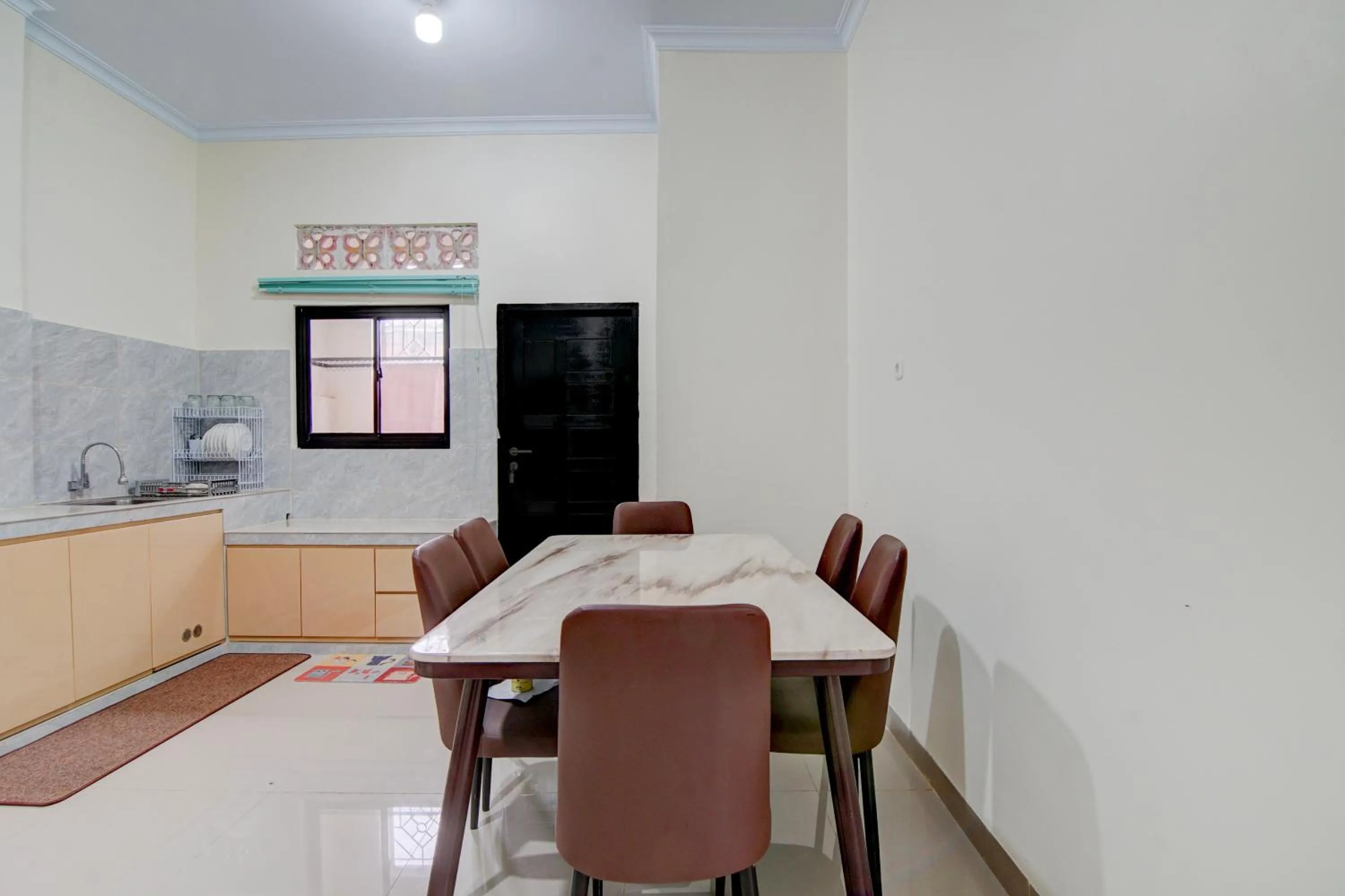 kitchen in OYO 94758 Kamila House