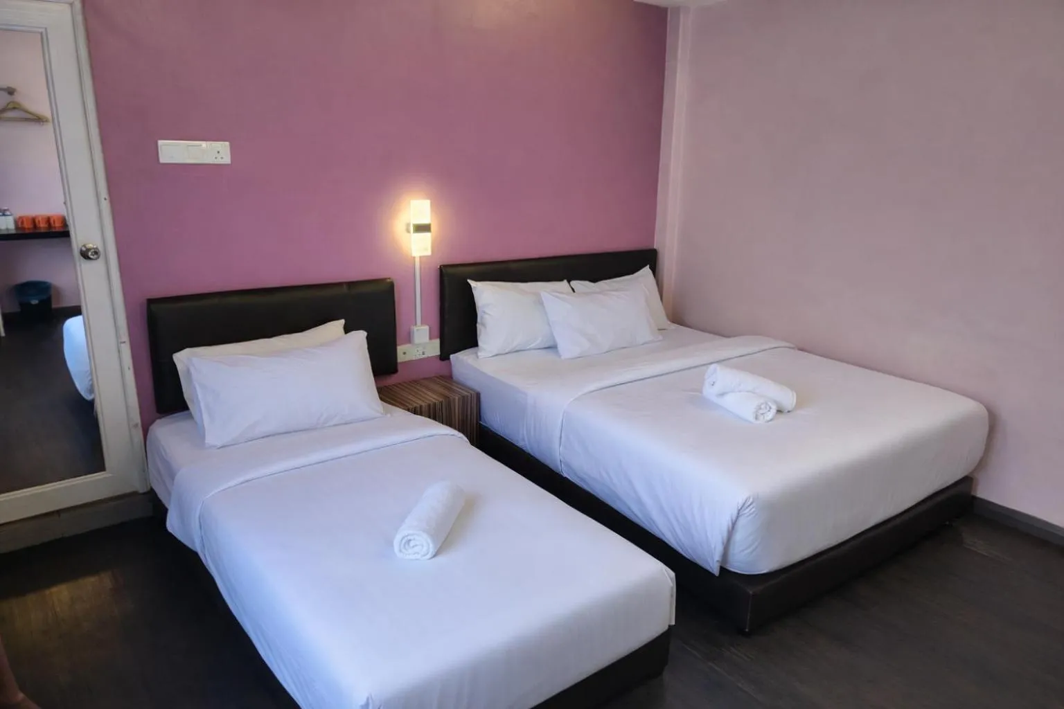 Photo of the whole room, Bed in Newland Hotel by Ardens - Taman Pelangi, Johor Bahru