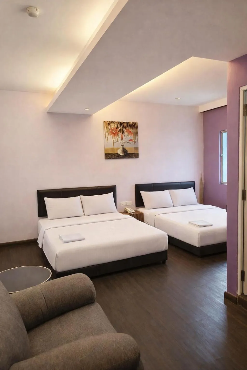 Photo of the whole room, Bed in Newland Hotel by Ardens - Taman Pelangi, Johor Bahru
