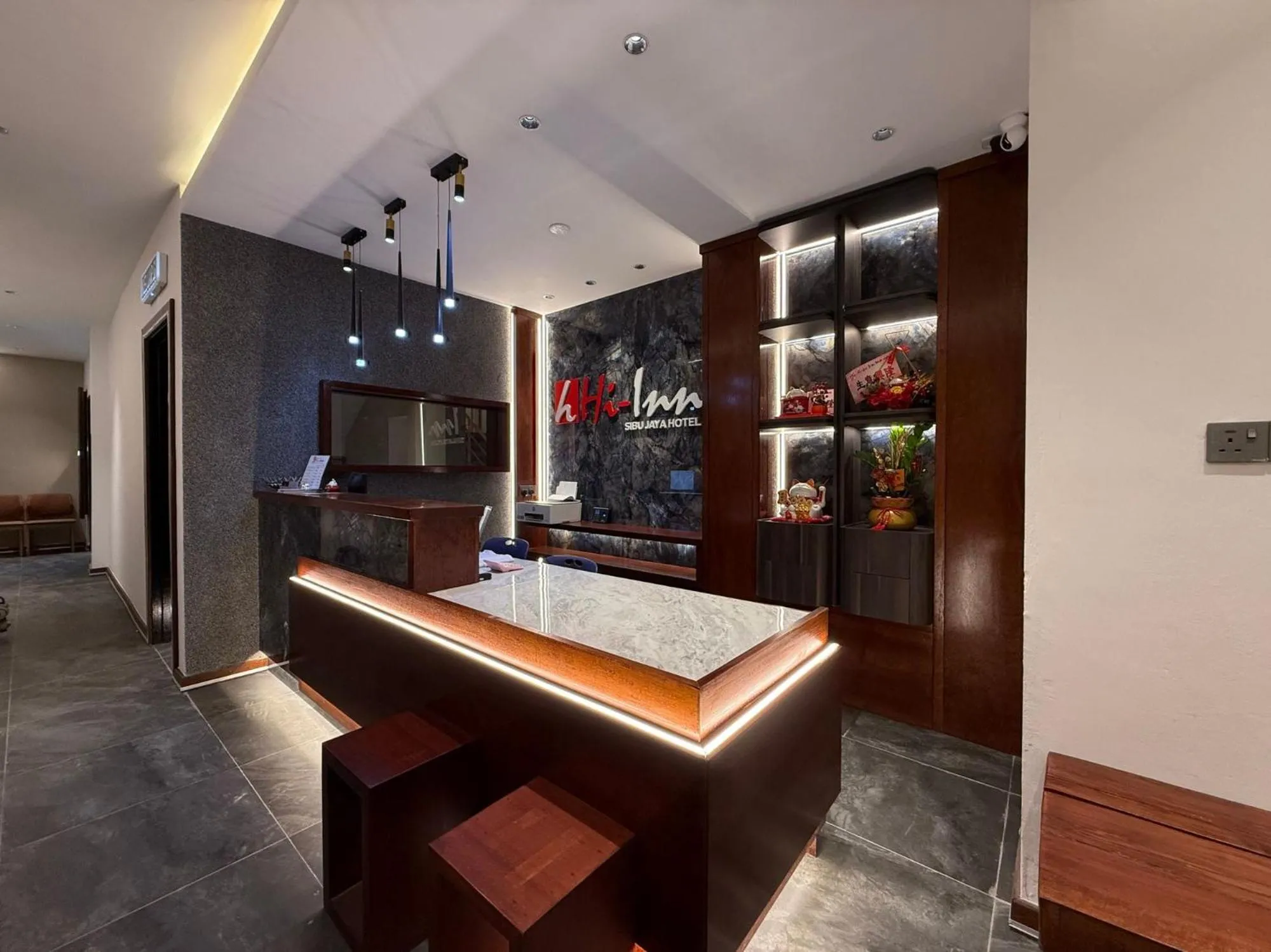 Lobby or reception in OYO 91193 Hi Inn Sibu Jaya